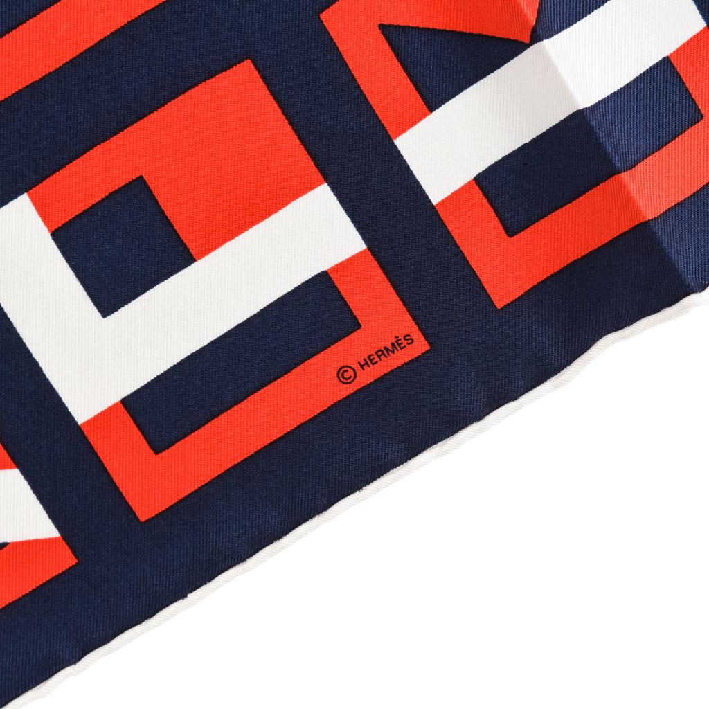 Guaranteed authentic Hermes Lettres Au Carre 45 scarf.
Features the alphabet in Deco style in bold Blanc, Marine and Rouge
NEW or NEVER WORN
final sale

SCARF MEASURES:
18