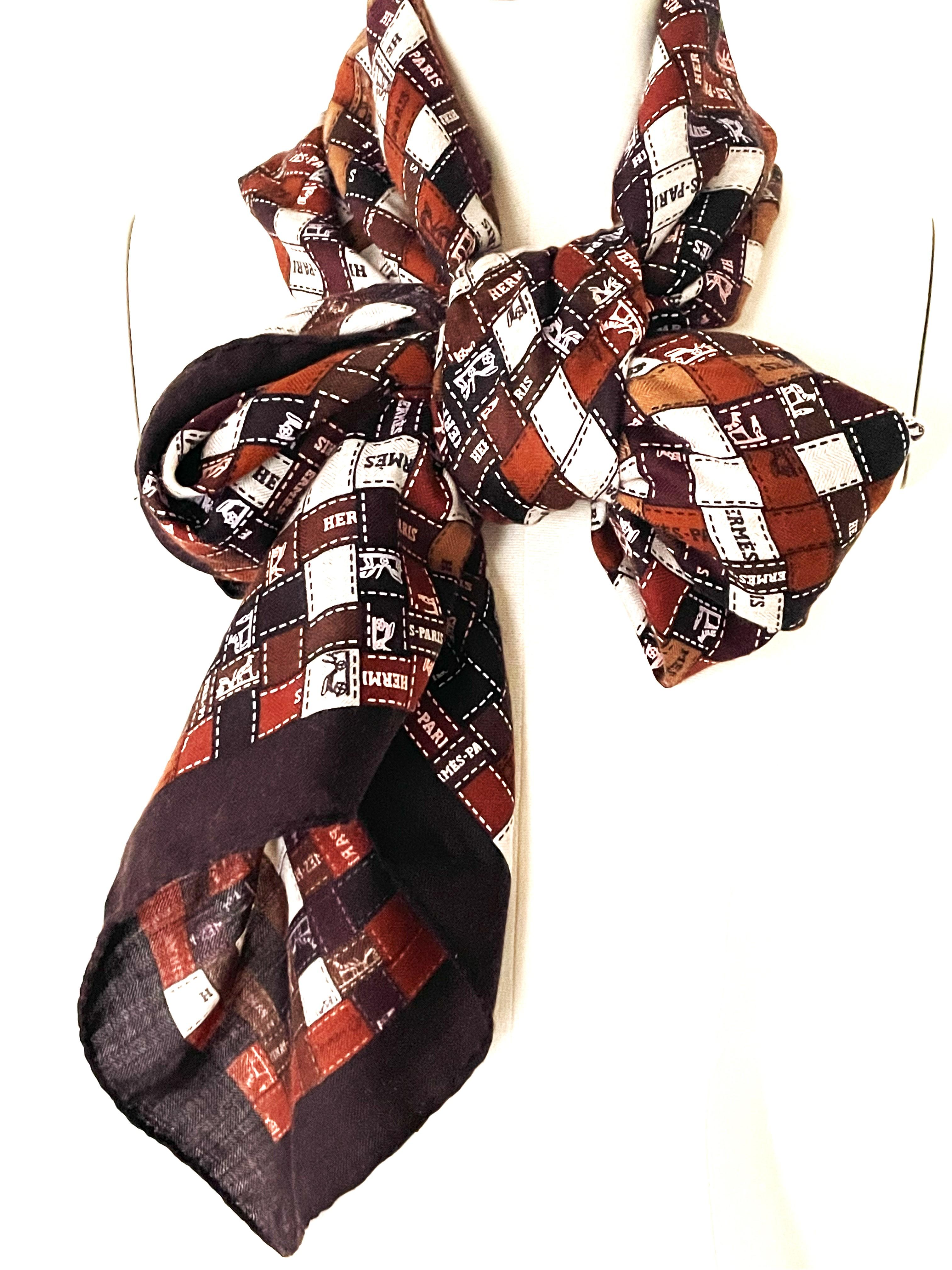 Black HERMÉS SCARV Cashmere/Silk, 140 x 140 cm printed with the iconic Hermes ribbon For Sale