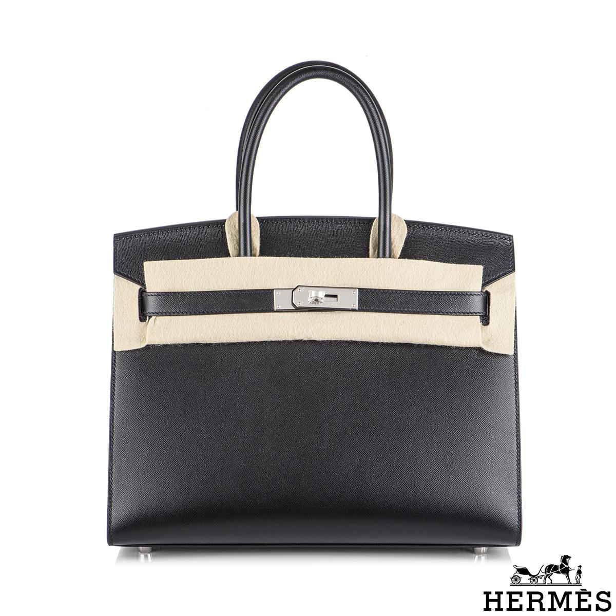 An exquisite Hermès Sellier Birkin 30 bag. The exterior of this birkin features veau madame leather in black. The black leather is complimented with palladium hardware. This birkin is in Sellier style which features topstitching on the outside, this