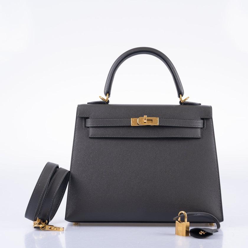 Hermès Sellier Kelly 25 Graphite Epsom Gold Hardware

Graphite has long been a favorite dark gray among Hermès collectors, but it hasn’t seen regular production for years. Often paired with contrast stitching, this 25cm Sellier Kelly from 2022 takes