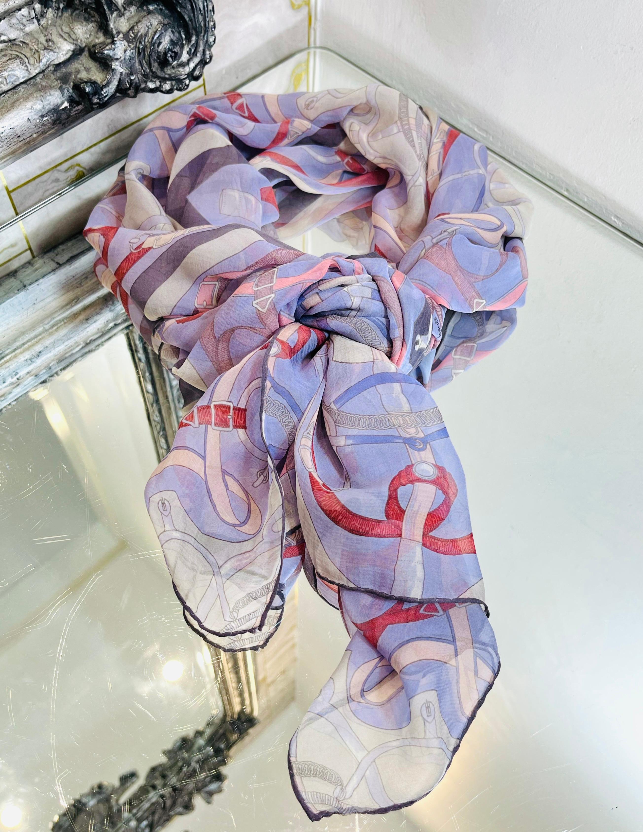 Hermes Sellier Printed Silk Scarf

Light purple scarf designed with buckle and chain prints in light pink and red.

Detailed with 'Hermes Tallier Paris' inscription and black finished edges.

Size – 173/63cm

Condition – Very Good

Composition –