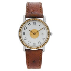 Hermès Montre Sellier en acier inoxydable avec cadran blanc et or et quartz brun SE4.210