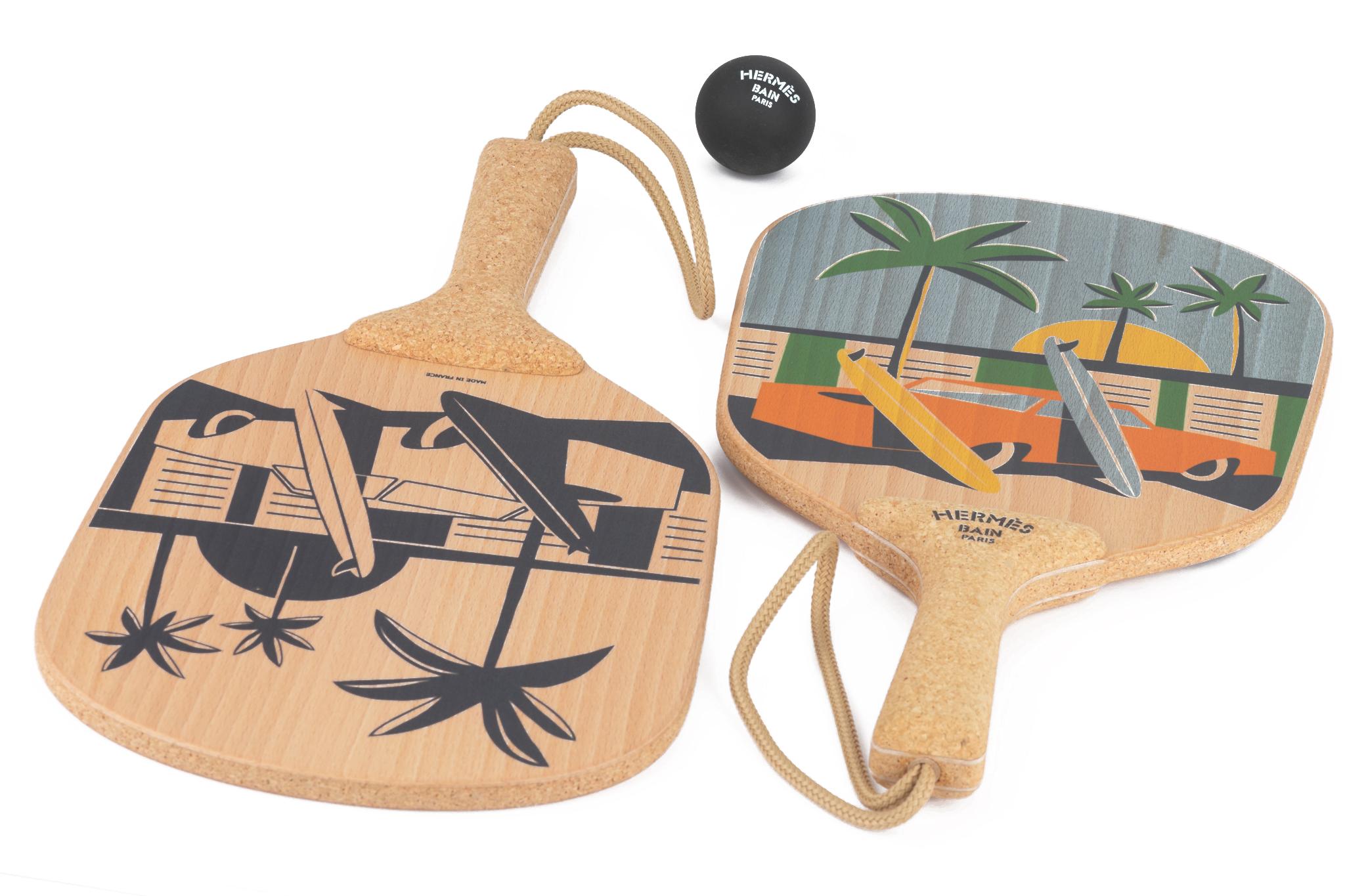 Hermès brand new in box set of 2 beach rackets in printed beechwood and cork, rubber ball, dust cover and box included.
