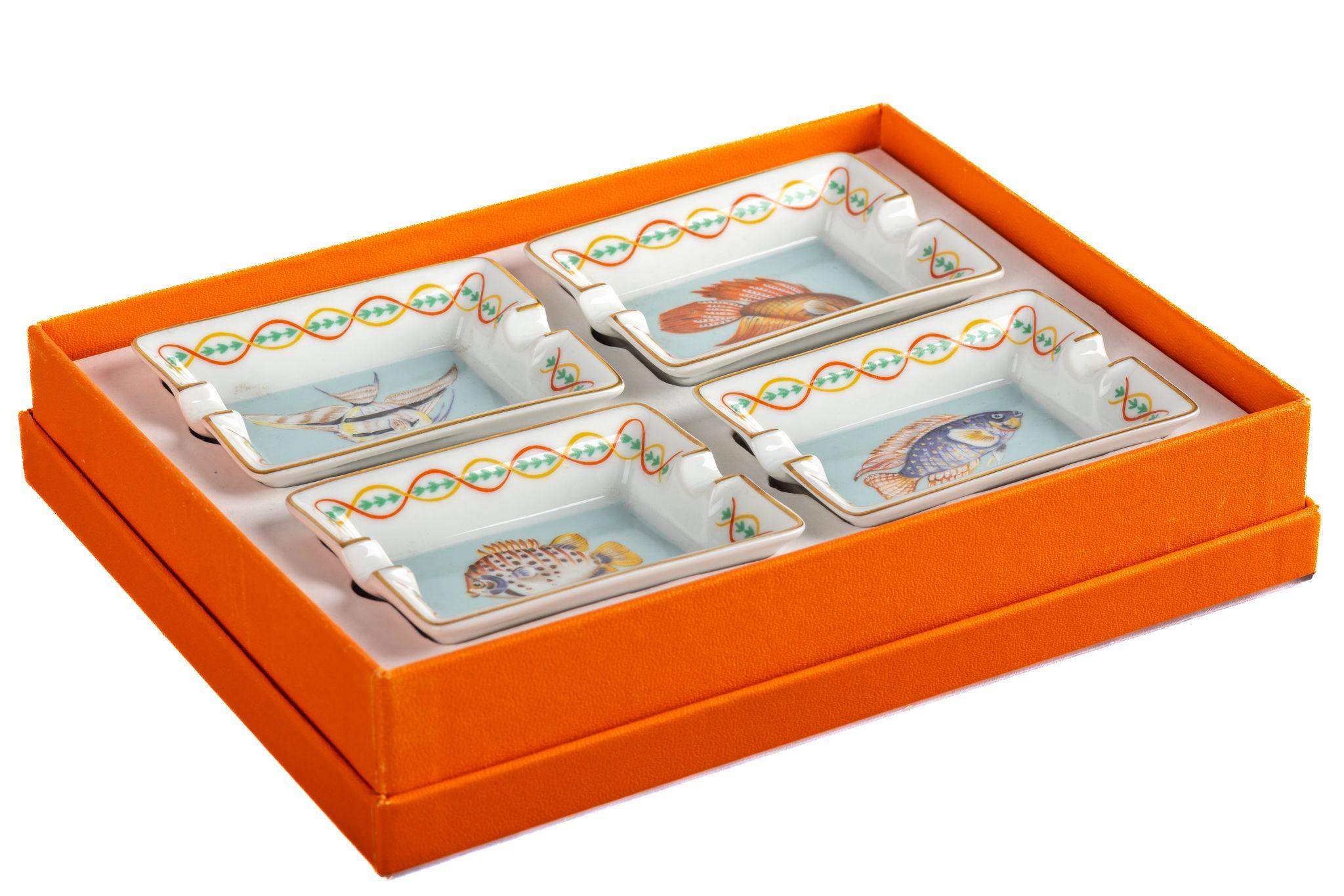 Hermes set of 4 multicolor mini ashtray with fish design. With original box.
