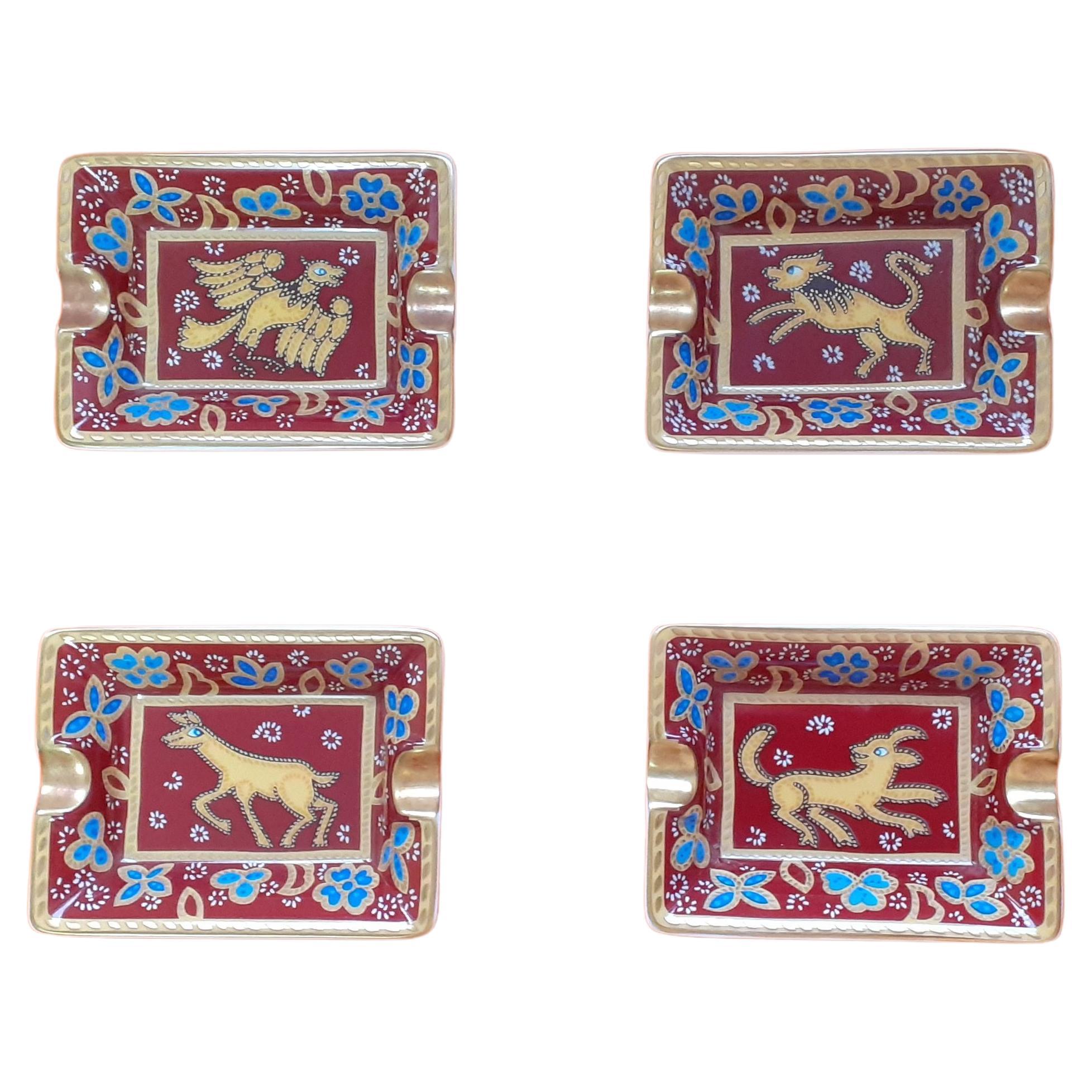 Hermès Set of four Small Ashtrays Porcelain and Gold Animals Prints