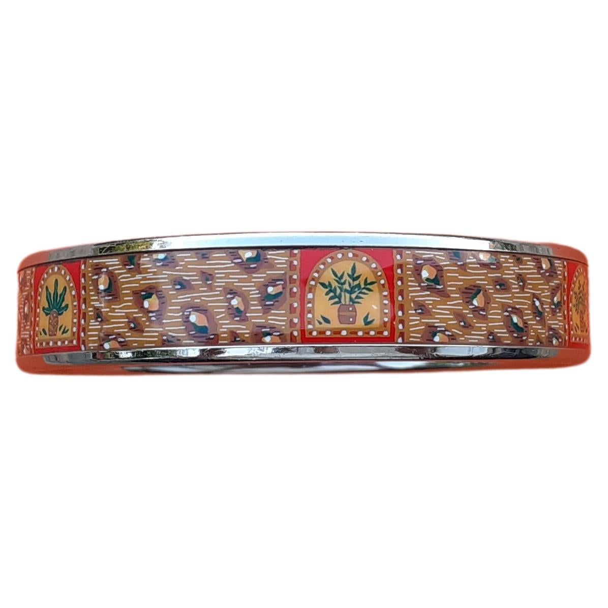 Lovely Authentic Hermès Set of Bracelet and Earings

You will receive a set of 3 pieces: 1 bracelet and 2 earrings

Clip earrings for pierced and non-pierced ears

Print: Leopard Fur + Cacti on the bracelet

Made in Austria + D (2000)

Made of