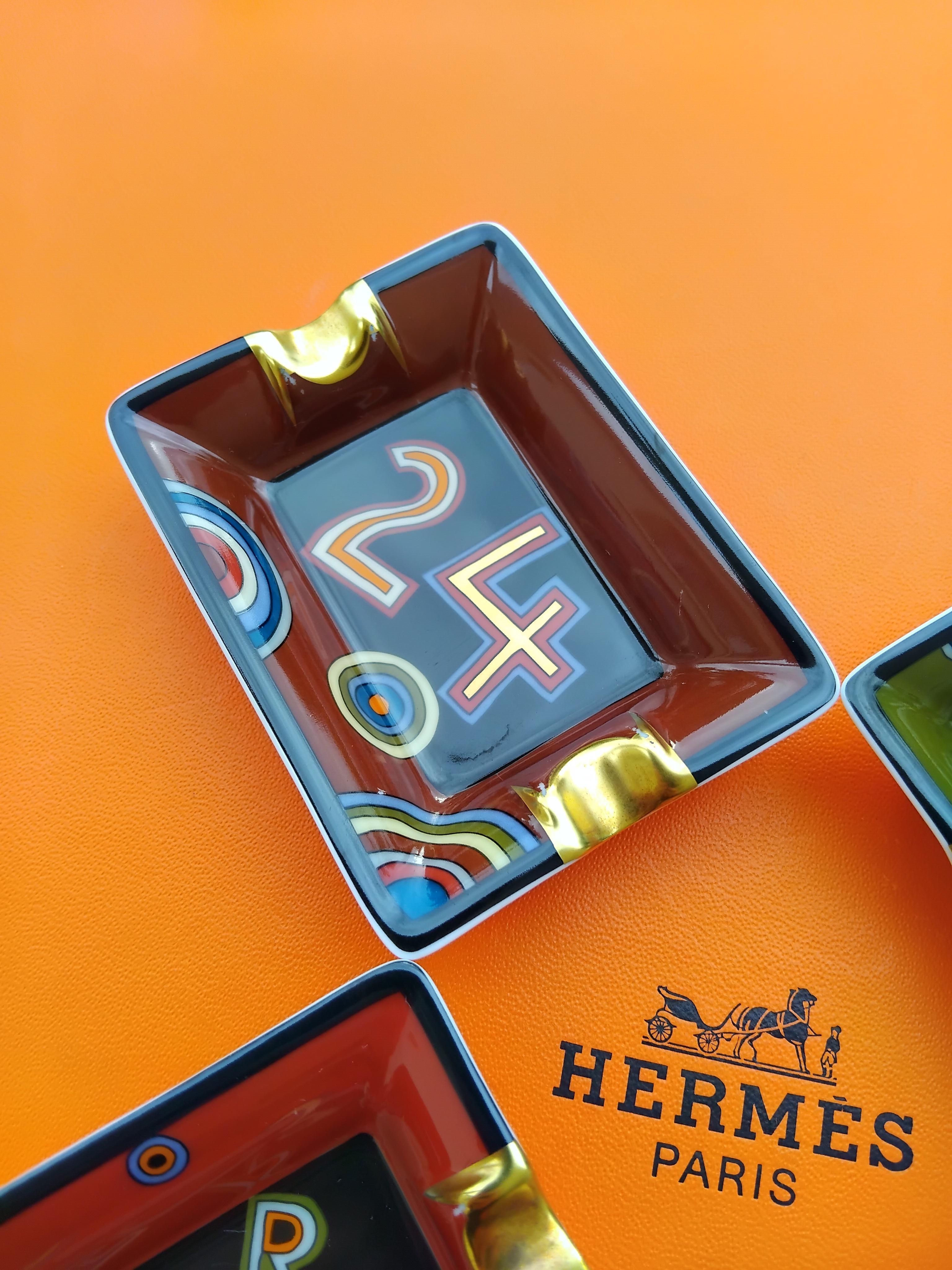 Hermès Set di quattro piccoli posacenere Tohu Bohu in porcellana e oro in vendita 8