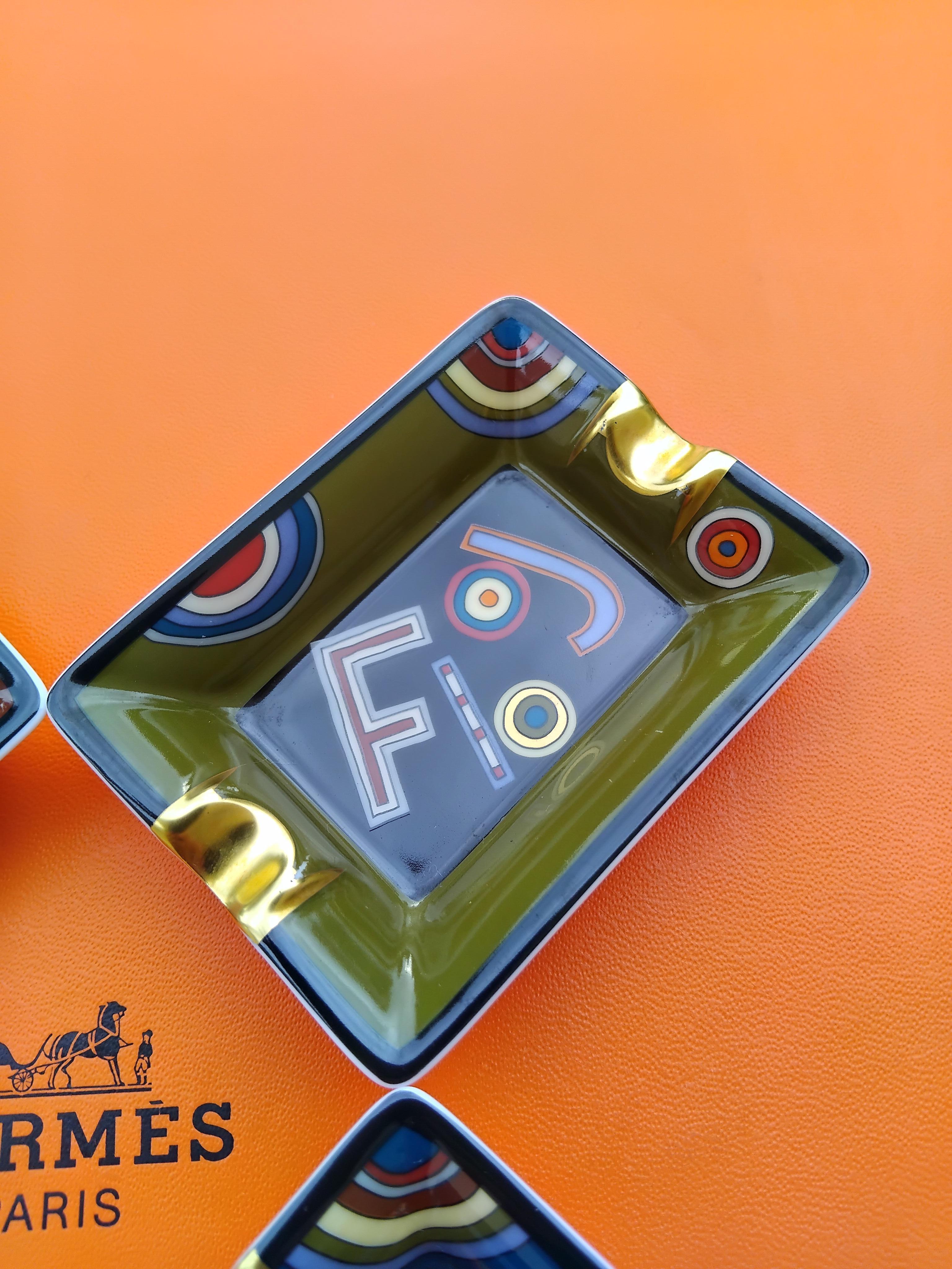 Hermès Set di quattro piccoli posacenere Tohu Bohu in porcellana e oro in vendita 9