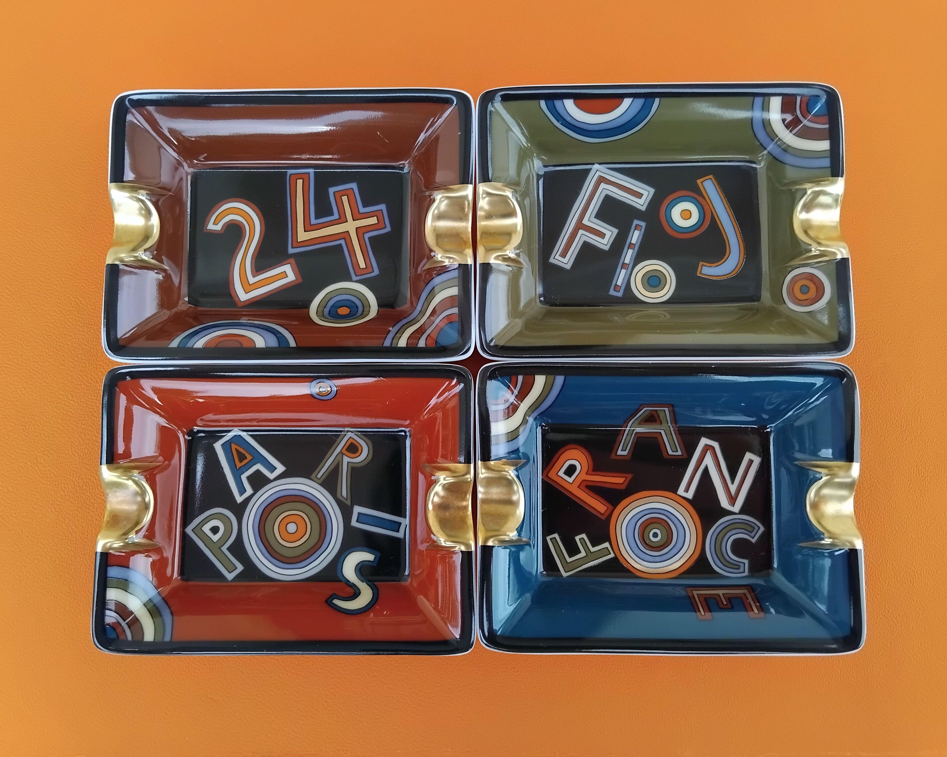 Nero Hermès Set di quattro piccoli posacenere Tohu Bohu in porcellana e oro in vendita