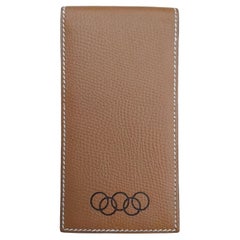Set de bloc de notas y funda Hermès en piel dorada Logo Juegos Olímpicos