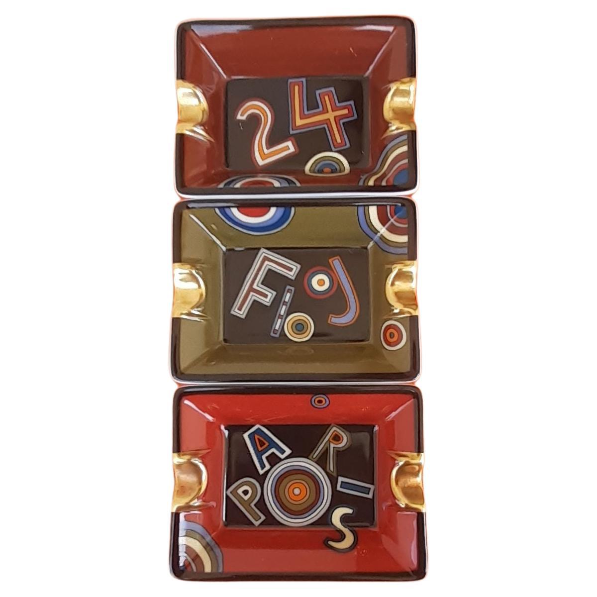 Hermès Set of Three Small Ashtrays Tohu Bohu Print Porcelain and Gold