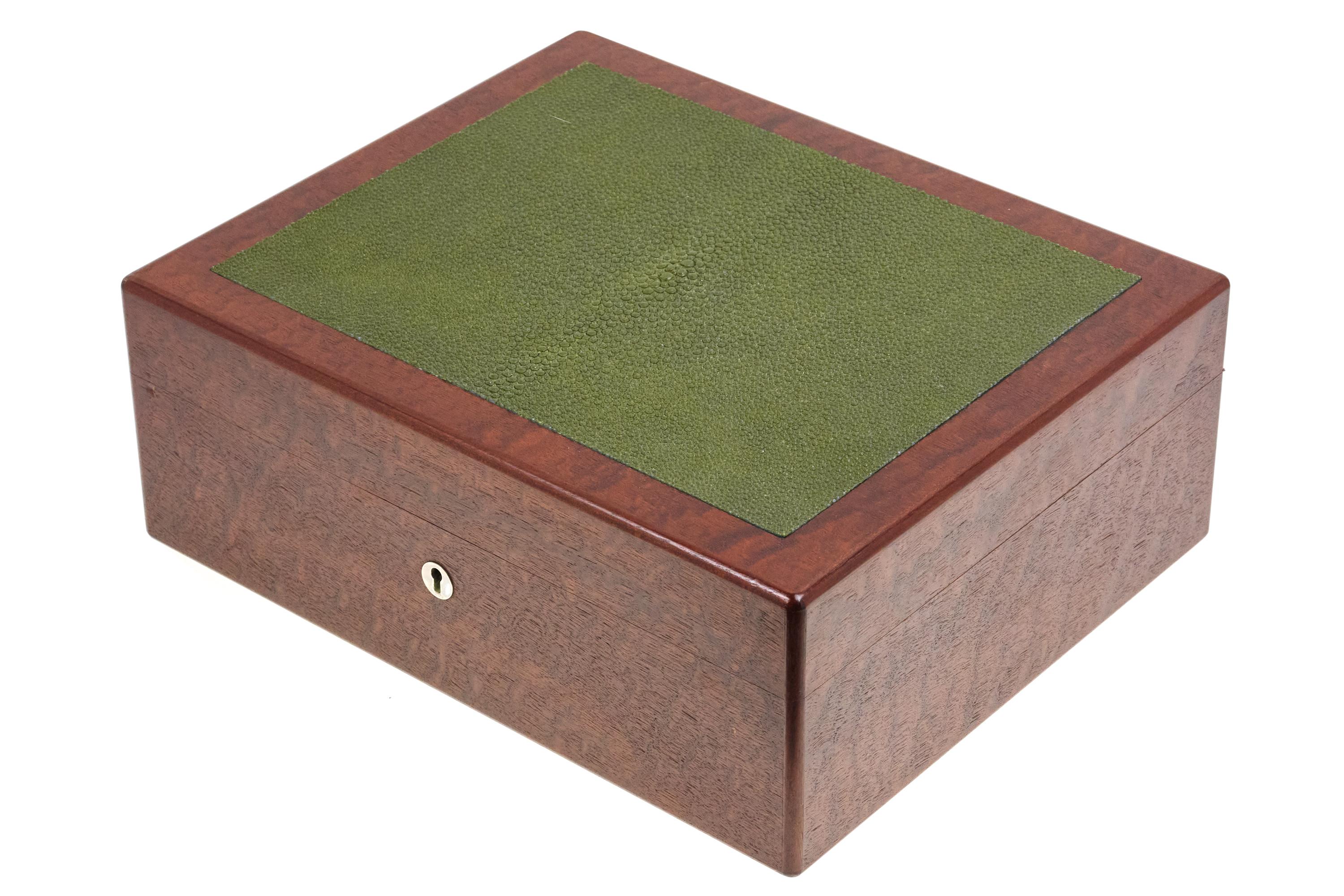 A fine and luxurious humidor by Hermes. Featuring a shagreen top, and incredibly clean interior.

Marked on interior edge
Measures: 12