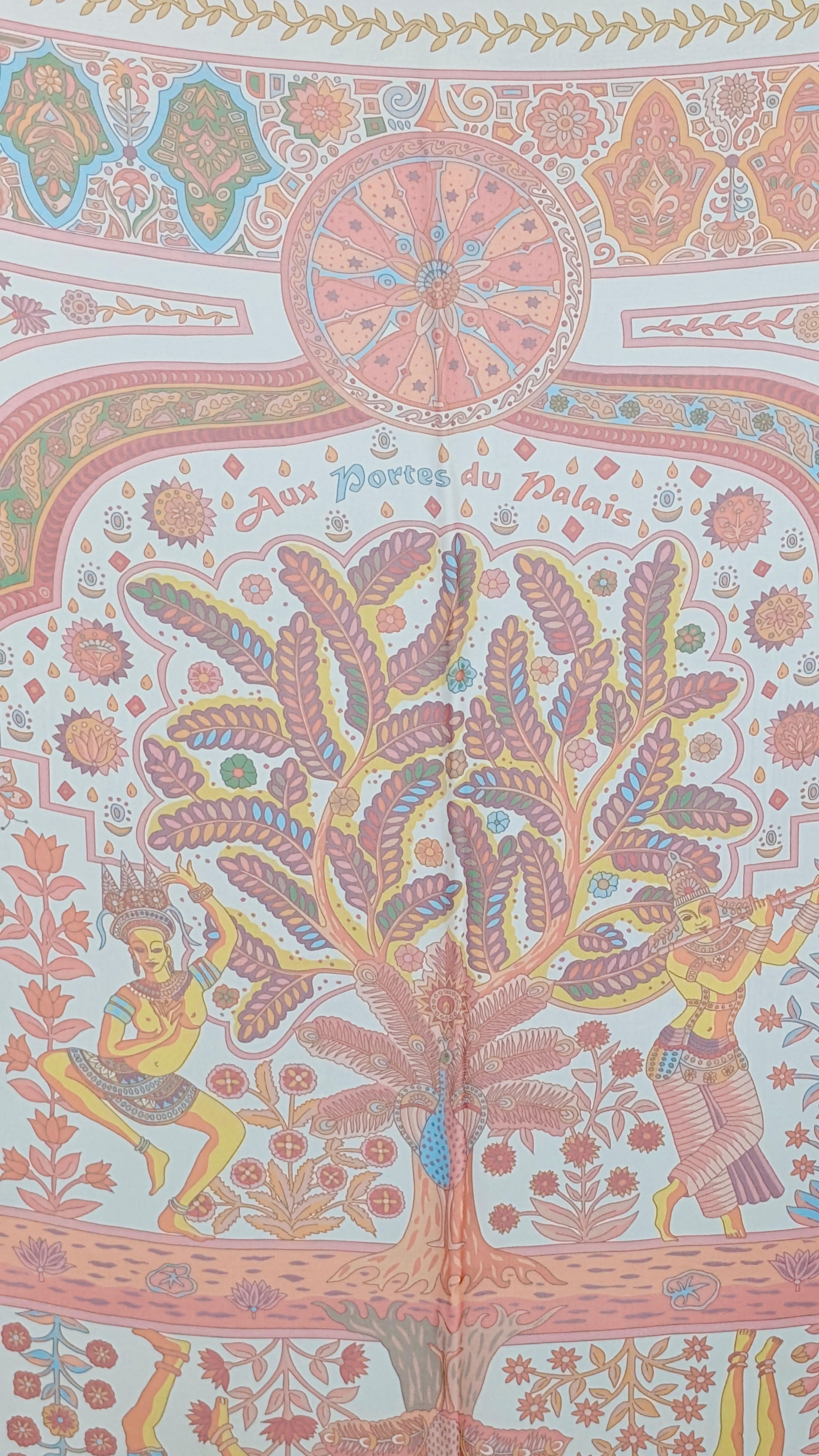 HERMÈS  mousseline silk shawl
Aux portes du Palais
Designed  by Christine Henry 2008
100% silk - mousseline silk
Copyright
Hand rolled hem
Tag care
Made in France
White, pink, orange, turquoise
 Measures approx.  cm. 133 x cm. 127
Perfect