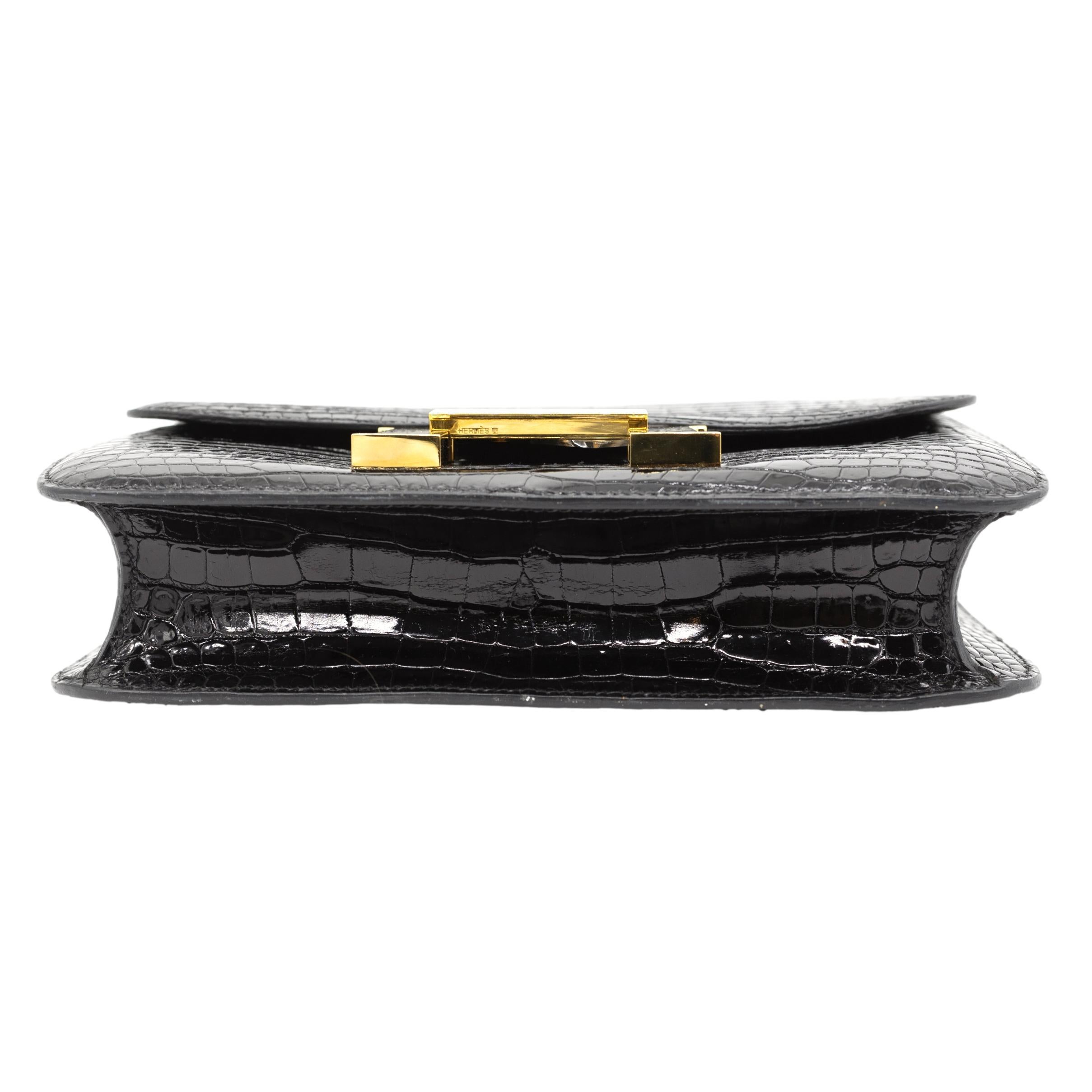 Hermès Shiny Black Porosus Crocodile 23cm Constance Bag with Gold Hardware, 2001 For Sale 2
