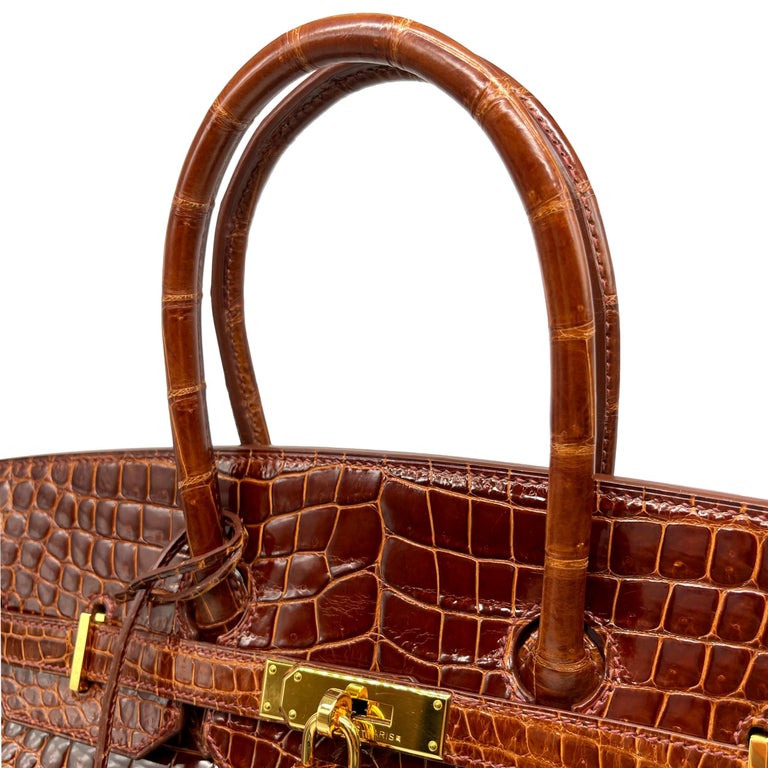 Hermès Shiny Miel Porosus Crocodile 35cm Birkin Bag with Gold Hardware, 2008. 9