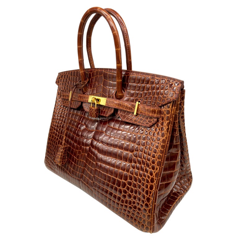 Brown Hermès Shiny Miel Porosus Crocodile 35cm Birkin Bag with Gold Hardware, 2008.