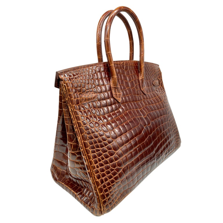 Women's or Men's Hermès Shiny Miel Porosus Crocodile 35cm Birkin Bag with Gold Hardware, 2008.