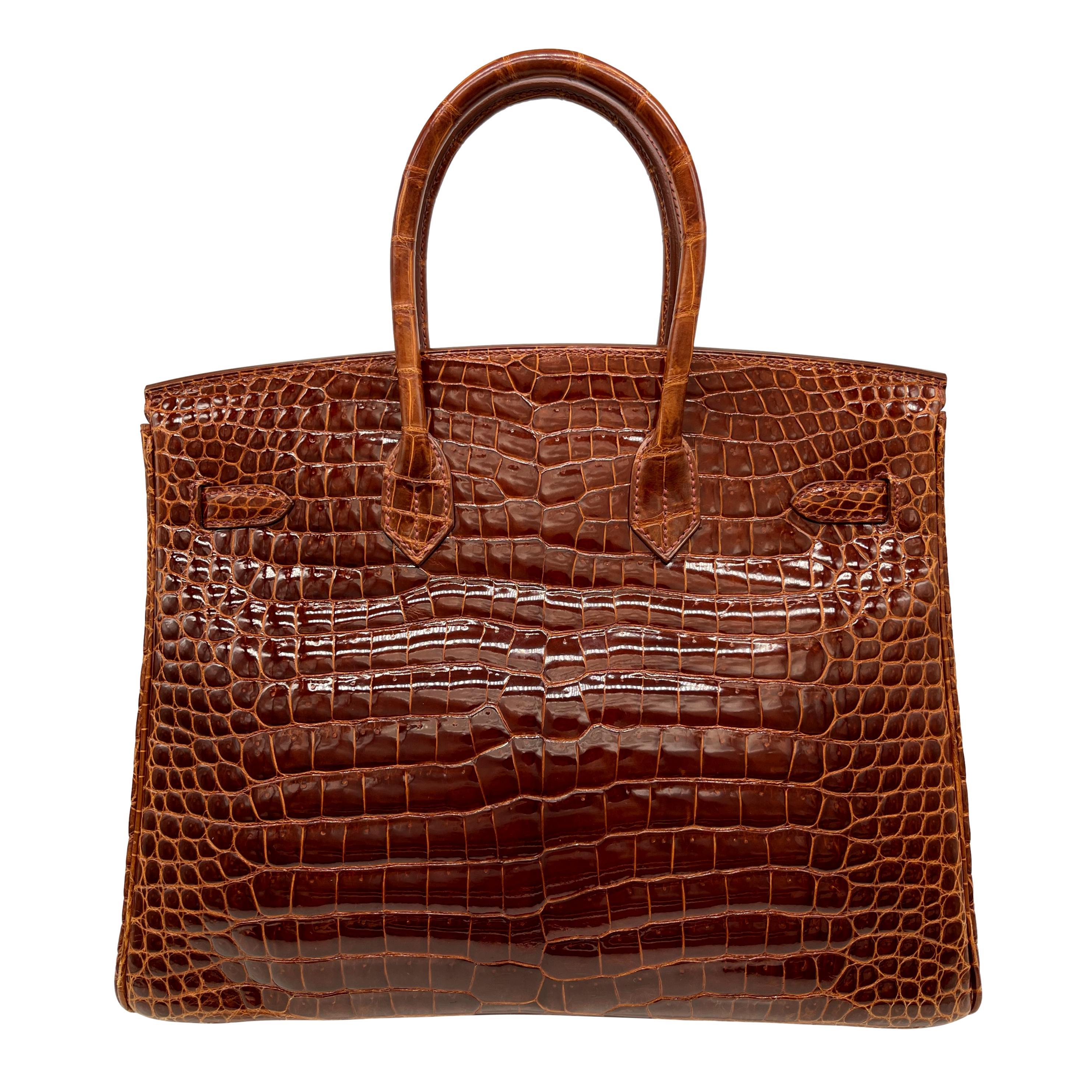 Brown Hermès Shiny Miel Porosus Crocodile 35cm Birkin Bag with Gold Hardware, 2008.