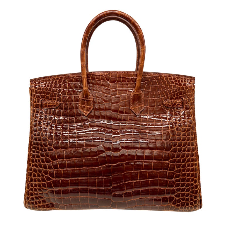 Hermès Shiny Miel Porosus Crocodile 35cm Birkin Bag with Gold Hardware, 2008. 1