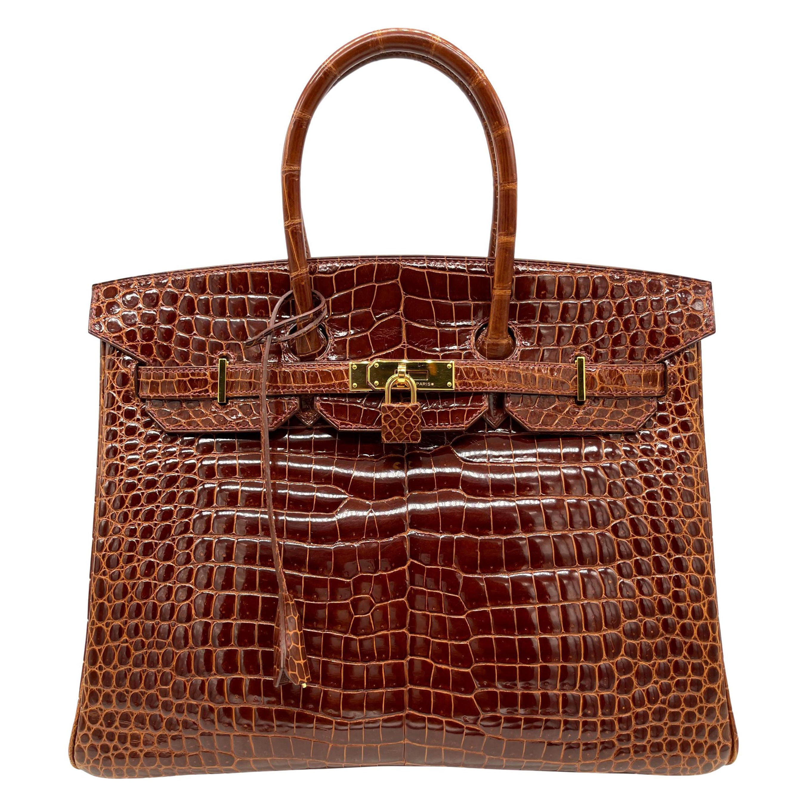 Hermès Shiny Miel Porosus Crocodile 35cm Birkin Bag with Gold Hardware, 2008.