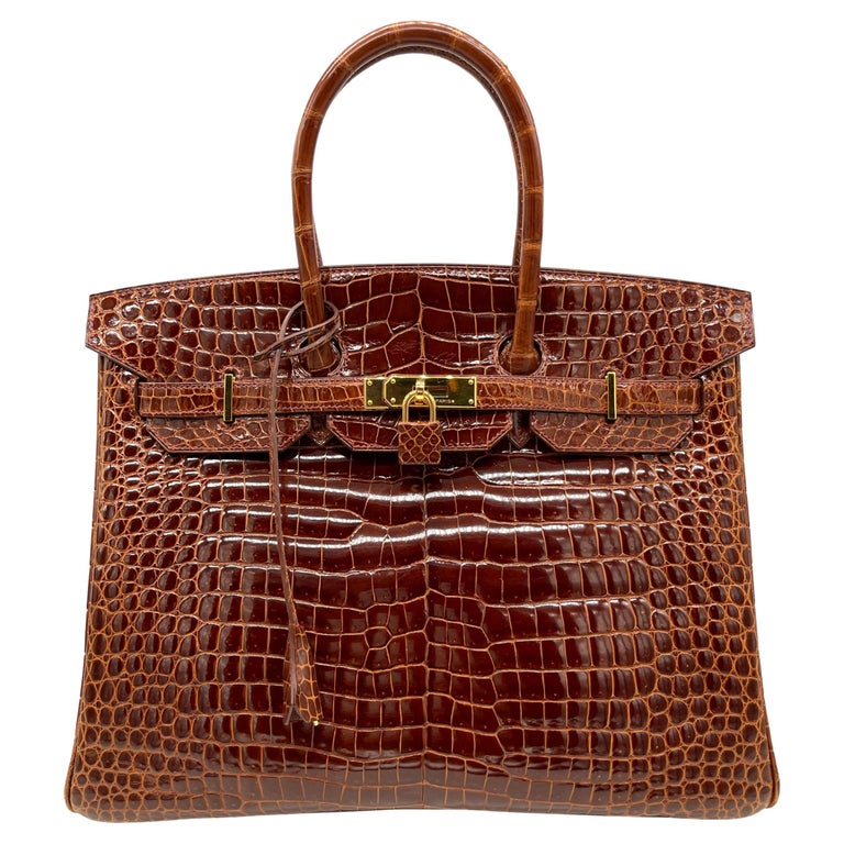Hermès Shiny Miel Porosus Crocodile 35cm Birkin Bag with Gold Hardware, 2008.