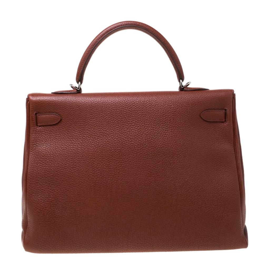 Inspired by none other than Grace Kelly of Monaco, Hermes Kelly is carefully hand-stitched to perfection. This Kelly Retourne is crafted from Togo leather and has silver-tone hardware. Retourne has a more casual look and is stitched on the inside