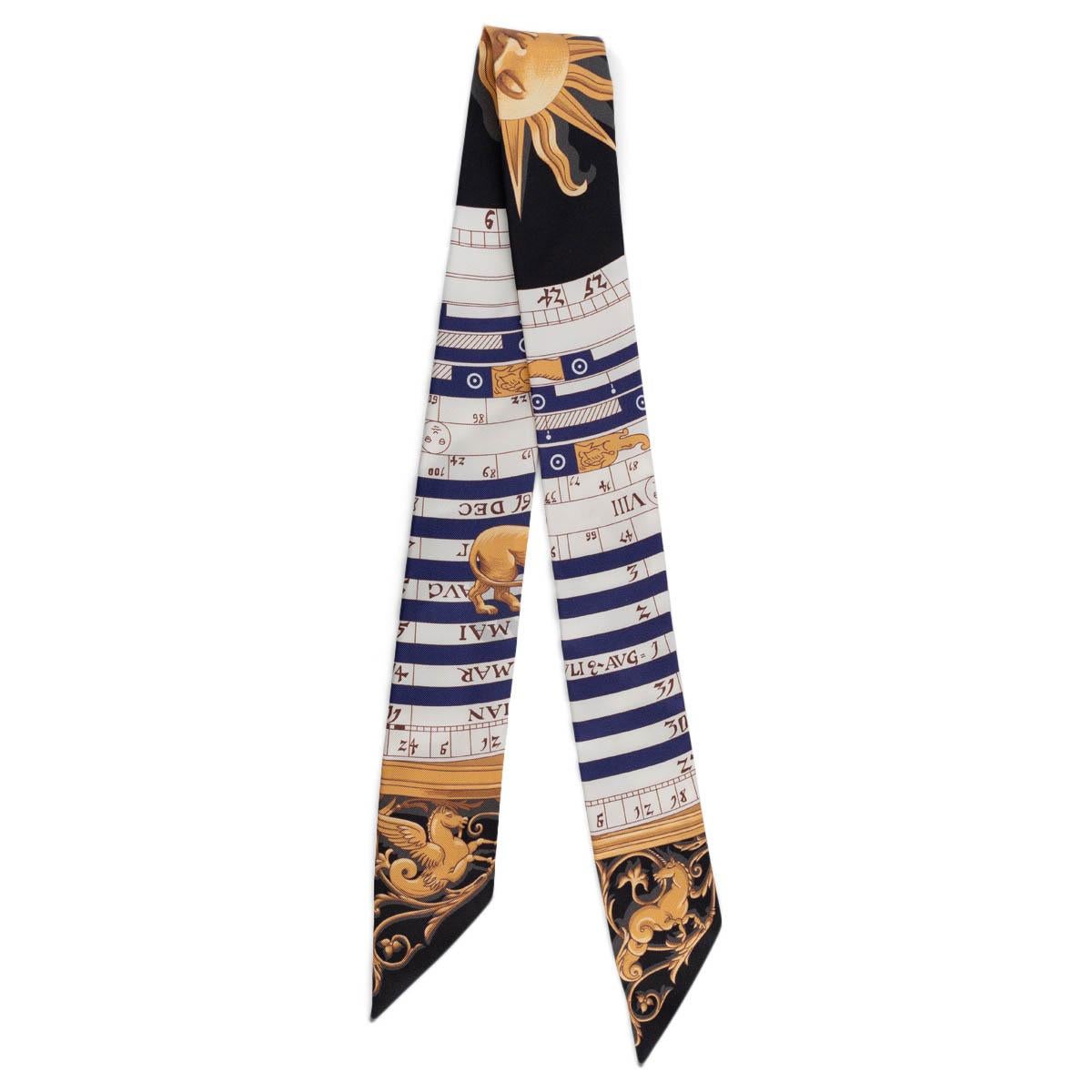 100% authentic Hermès Astrologie silk twilly in black, navy blue, white and gold. Has been worn and is in excellent condition.  

Measurements
Width	5cm (2in)
Length	86cm (33.5in)

All our listings include only the listed item unless otherwise