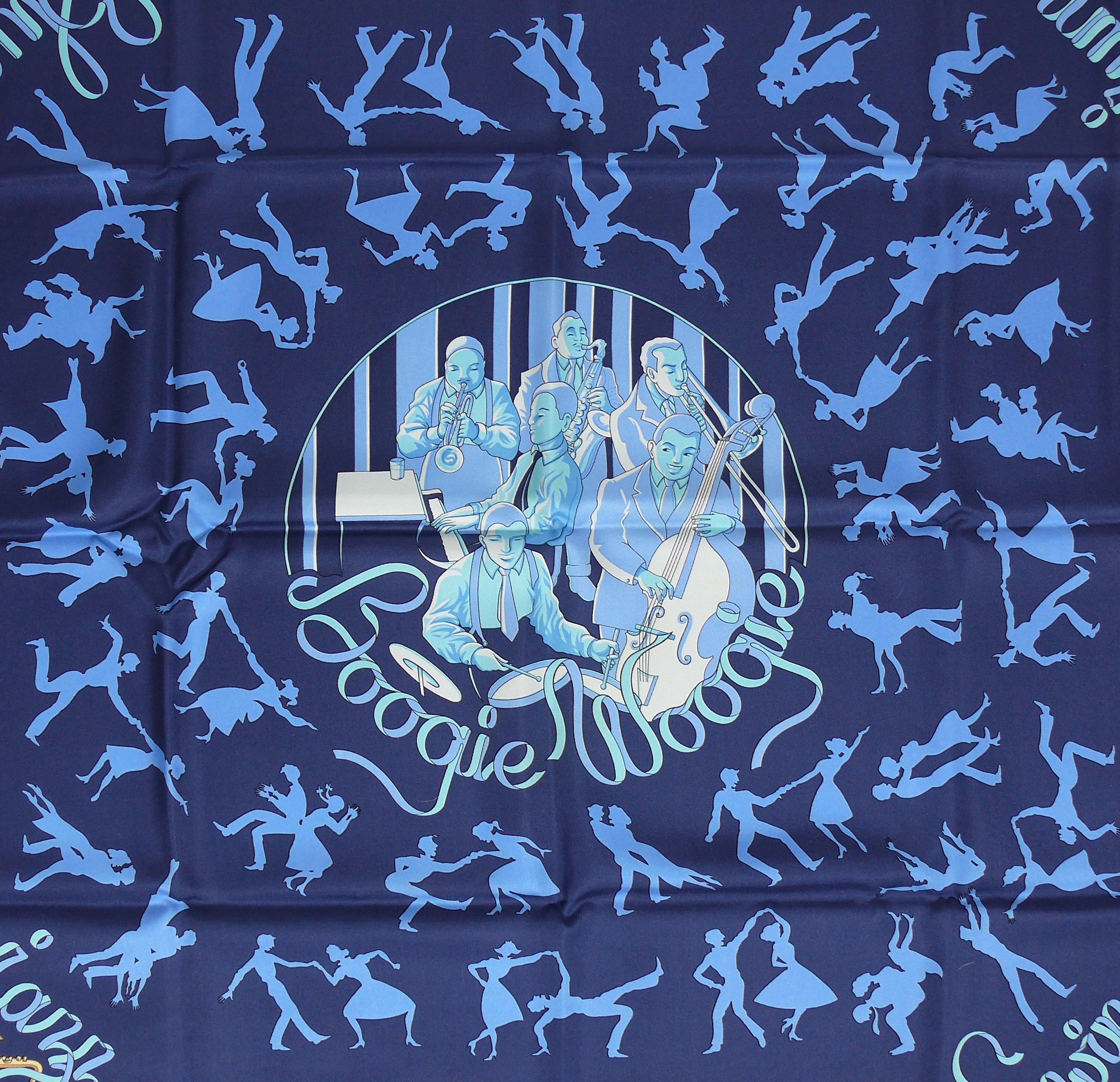 HERMES rare silk carré scarf BOOGIE WOOGIE featuring an elaborate design of couples dancing on a navy blue background.

Issued in 2003.

Designed by SOPHIE KOECHLIN.

This scarf features :
- Hand rolled borders.
- 100 % silk.
- Composition and care