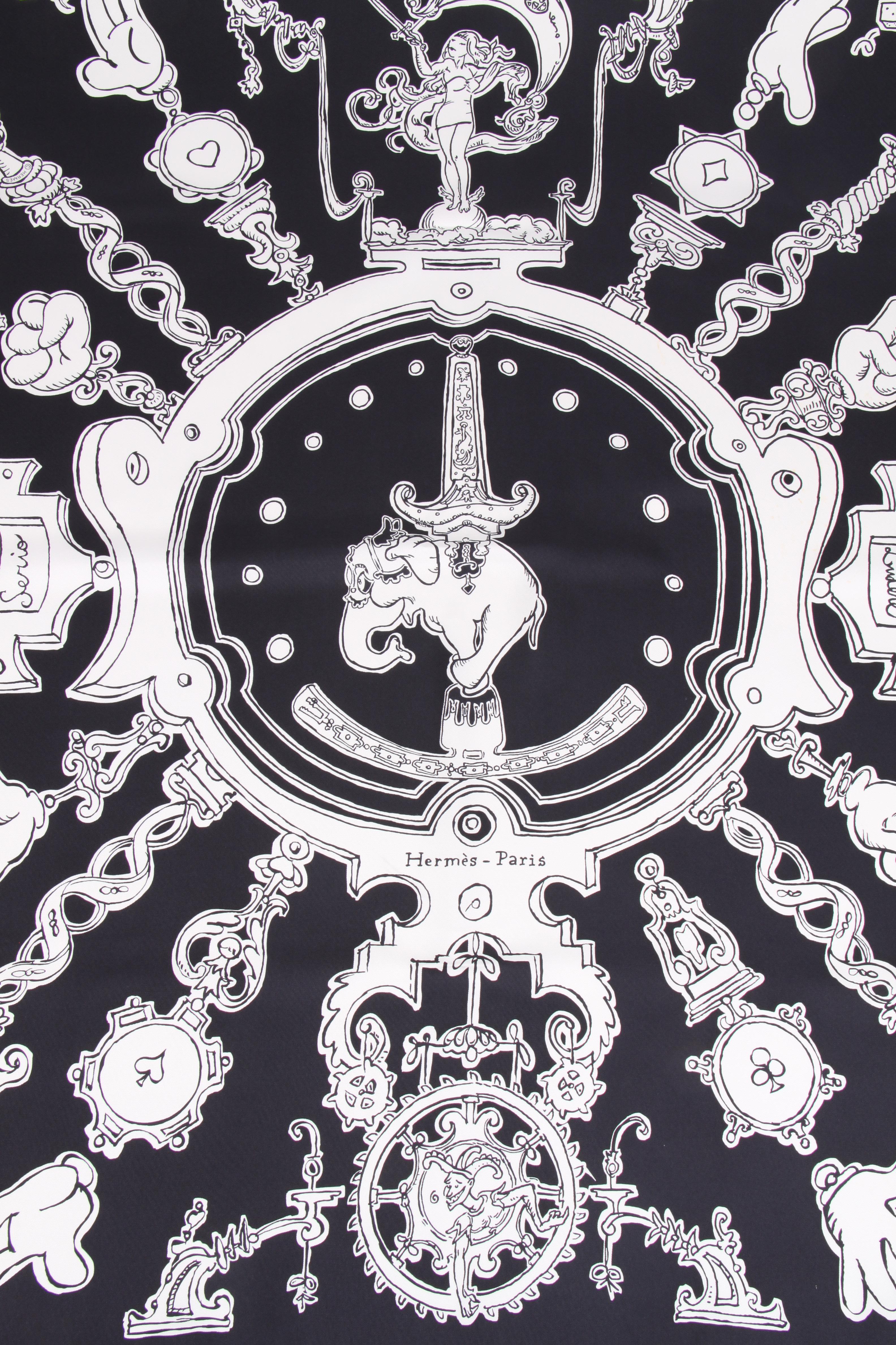 This amazing silk scarf by Hermes is covered with a black and white print. The foundation is black.

Name: Serio Ludere
Measurements: +/- 90 x 90 centimeters
Colors: black, white
Material: silk
Condition: good, unfortunately some small stains in the