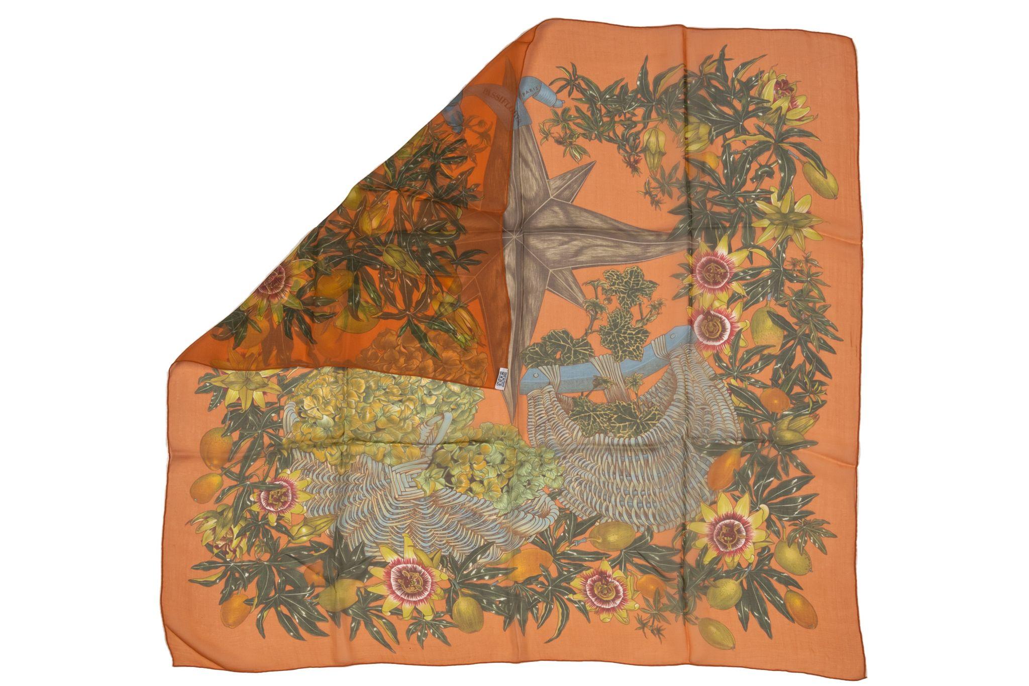 'Passiflores' is a famous floral themed design for Hermes, by Valerie Dawlat-Dumoulin. Designed in 1996, the rich colours and detailed design have made this a very collectable scarf over the years. Item is in excellent condition.