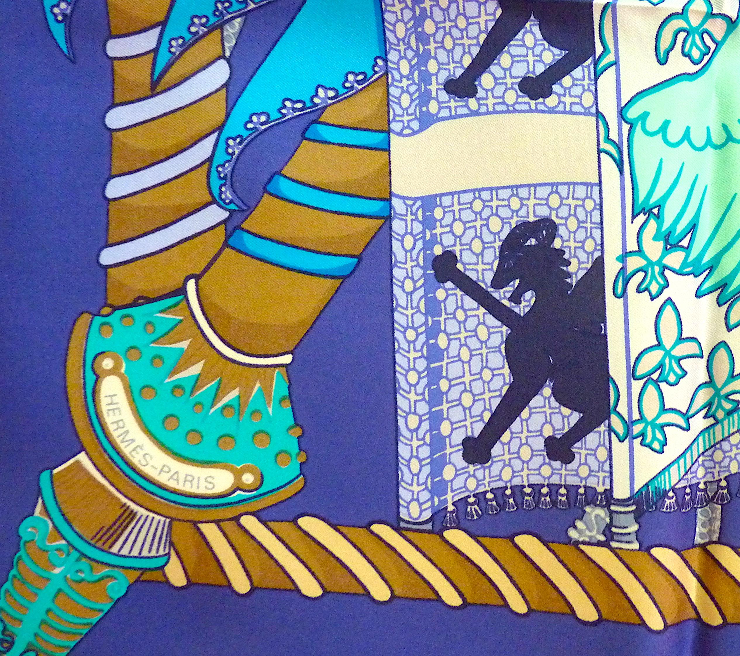 Echarpe HERMES en soie bleue Etendards et Bannières par Annie Faivre,  Jamais porté, première édition en 1984

Nuances de bleu exquises : fond bleu profond, bleu turquoise doux et bleu ciel à motif bleu bébé

ÉTAT : État impeccable ! Jamais porté