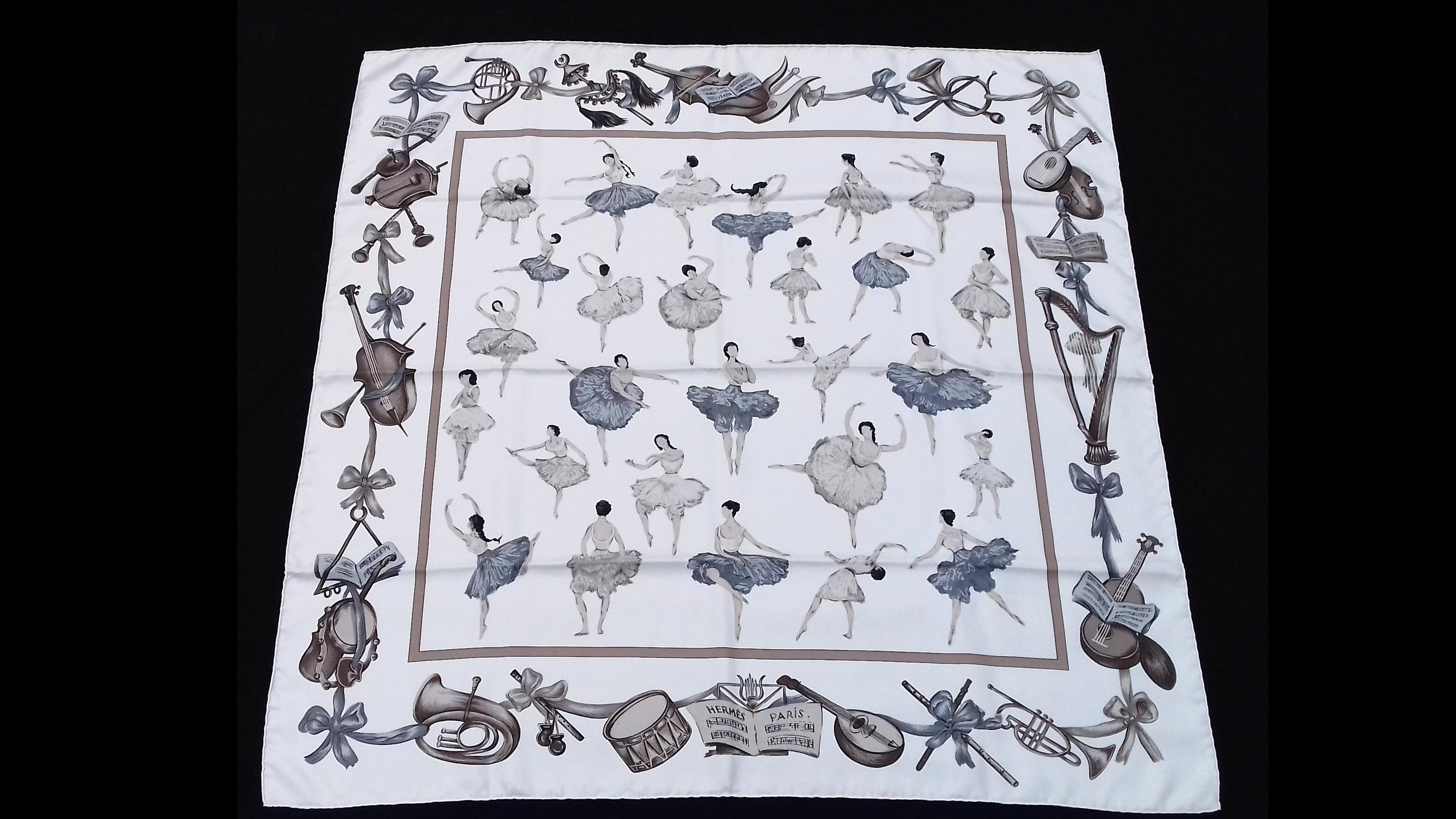 Absolutely Gorgeous Authentic Hermès Scarf

Pattern: La Danse

Designed by Jean Louis Clerc in 1961. This one is a reissue

Made in France

Made of 100% Silk

Colorway: White Background, Etoupe (light Brown), Grey

