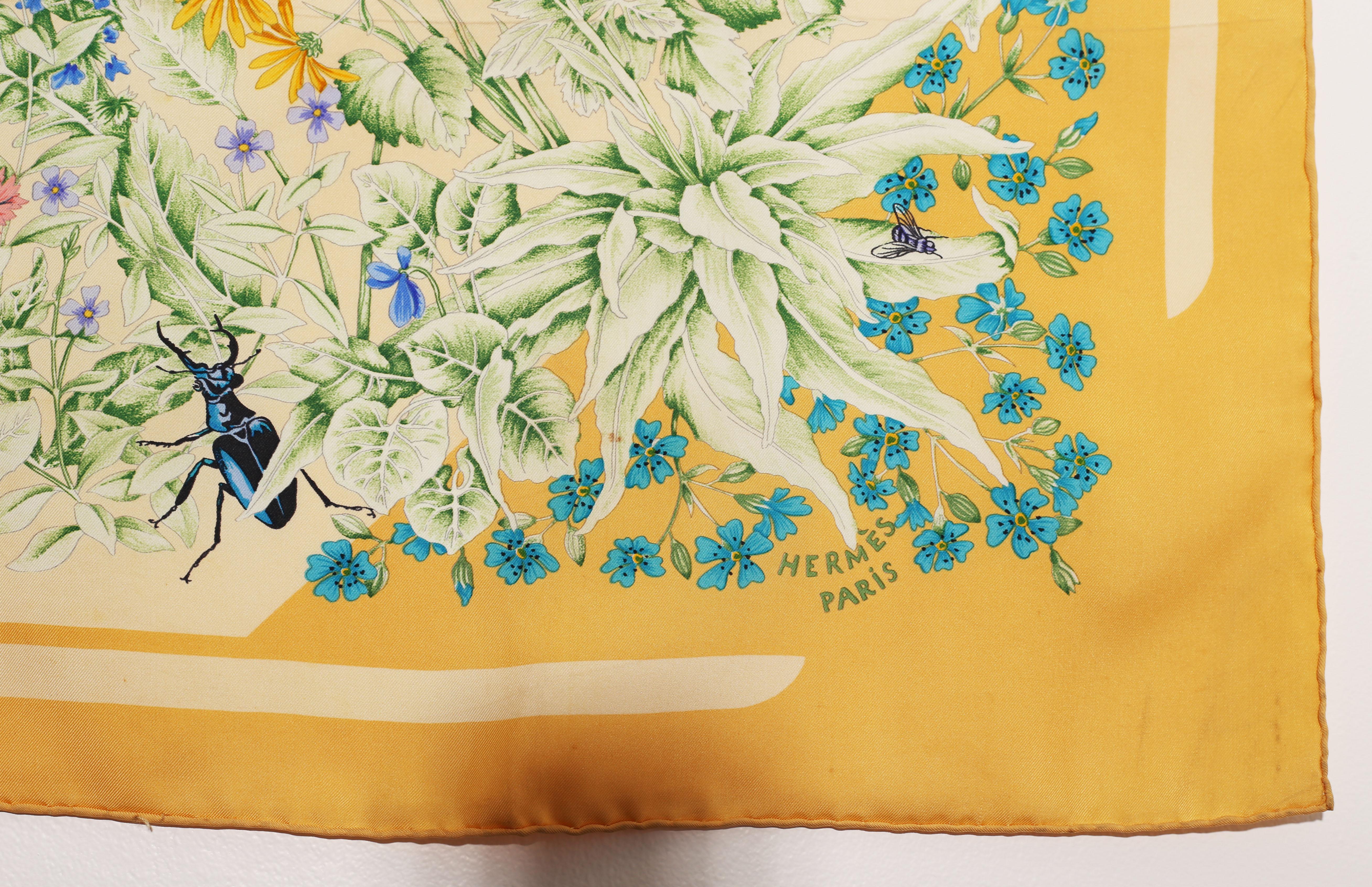 HERMES Scarf  Silk Scarf 100%  Paris, Made In France 
La Prairie Hermes scarf by Antoine de Jacquelot was first issued in 1994 and more recently reissued in 2002.  
Gorgeous color palette in  ochre yellow, punctuated by salmon pink and tourquoise