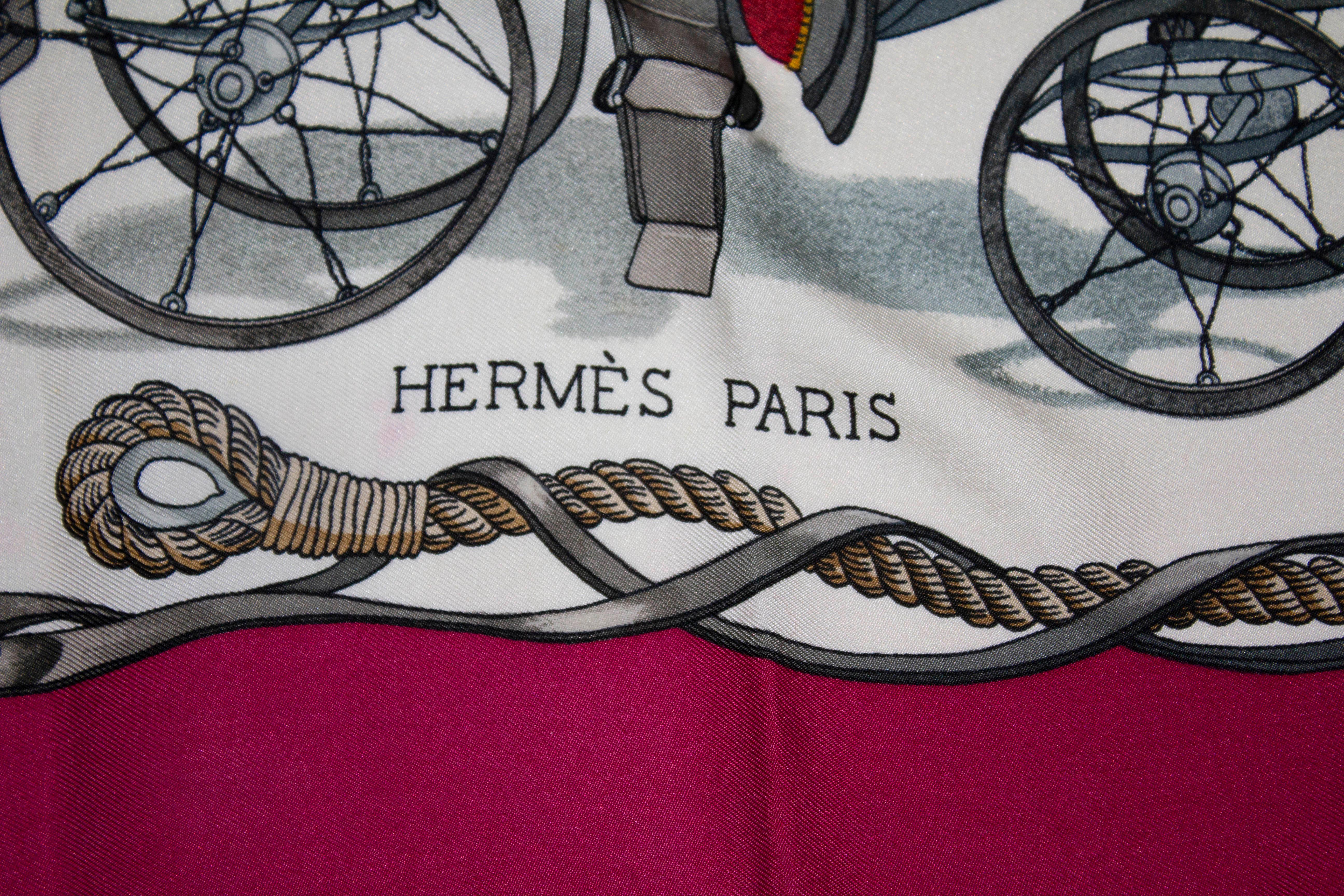 A pretty vintage Hermes silk scarf , Musee by Le Doux. The scarf has a burgundy colour border and there is a small amount of colour bleed, but is not noticeable when worn.