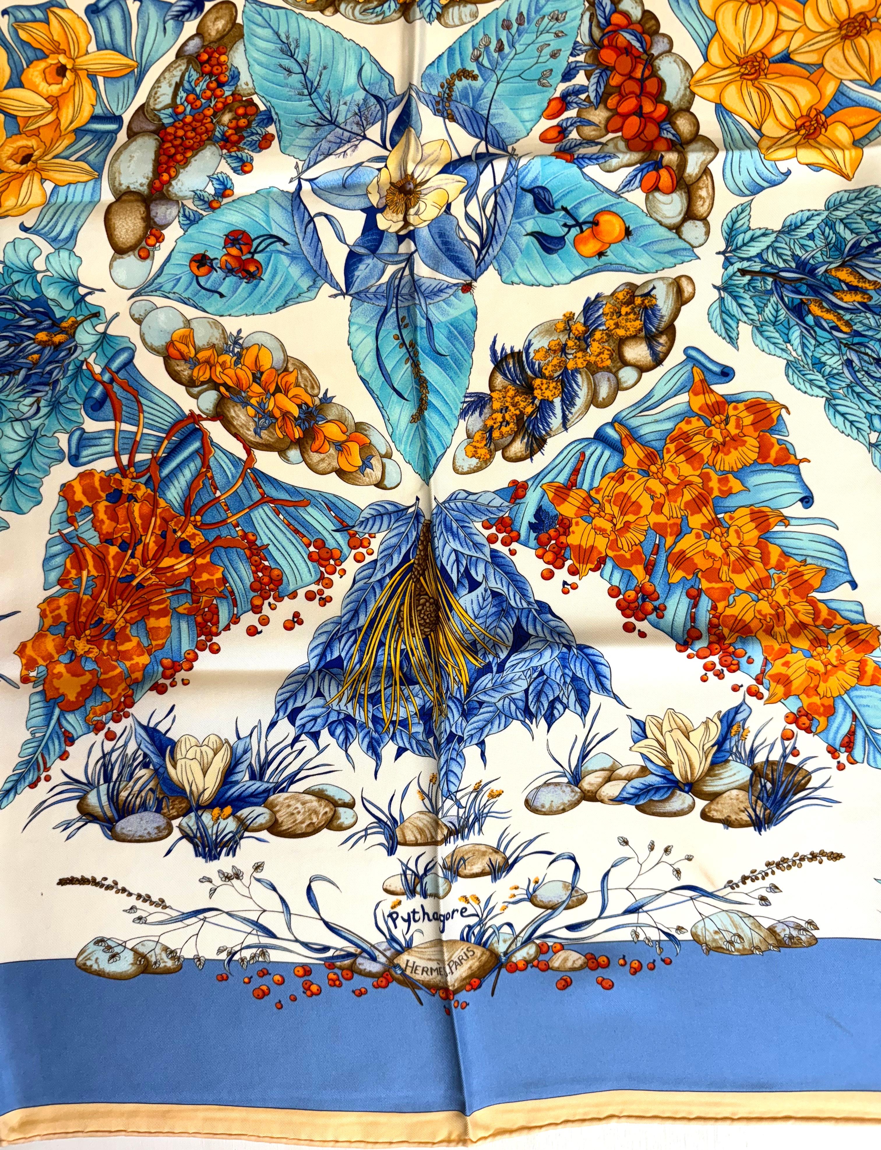 
Hermes Silk Scarf, Phytagore
Signed, designed by Zoe Pauwels in 1999. Decorated with foliage in tones of blue and orange on a white and sky-blue ground, appears to have never been worn, with Hermes box. (small verticle mark- 4in. in center.)
35 by