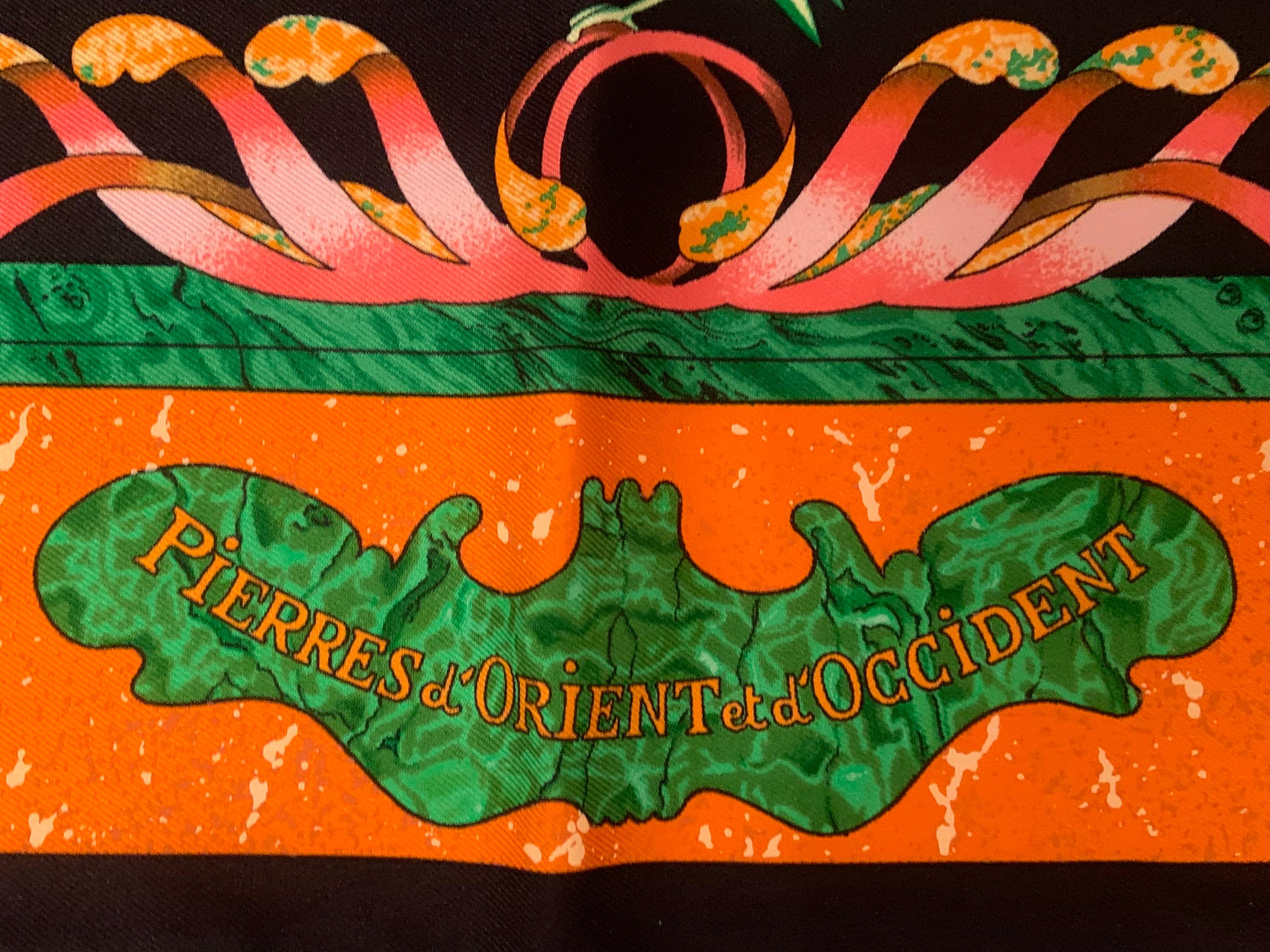 This colorful scarf was designed by Zoe Pauwels for Hermes in 1988. There are flowers, birds and even pearls necklaces created from stone marquetery in the central design and marble borders to complete the design.  It has never been worn and is in