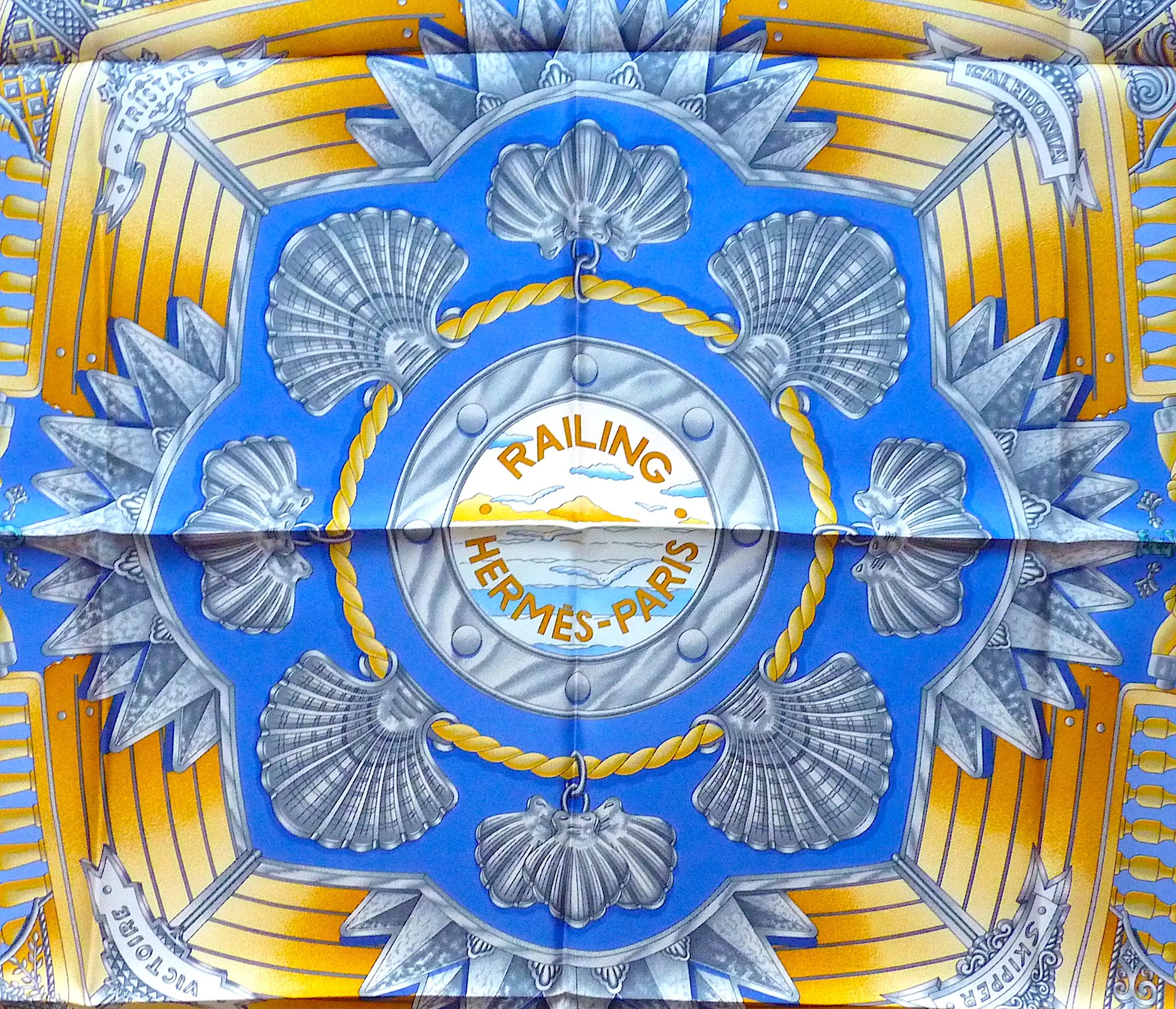 Gorgeous HERMES Silk Scarf, 90 cm x 90 cm , Entitled Railing, designed by Joachim Metz in 1998, Very sought after ! Absolutely Authentic and Unworn !

Care Tag attached, no box

Colors : Deep Blue, Sky Blue, Gold Pattern

Condition : Perfect