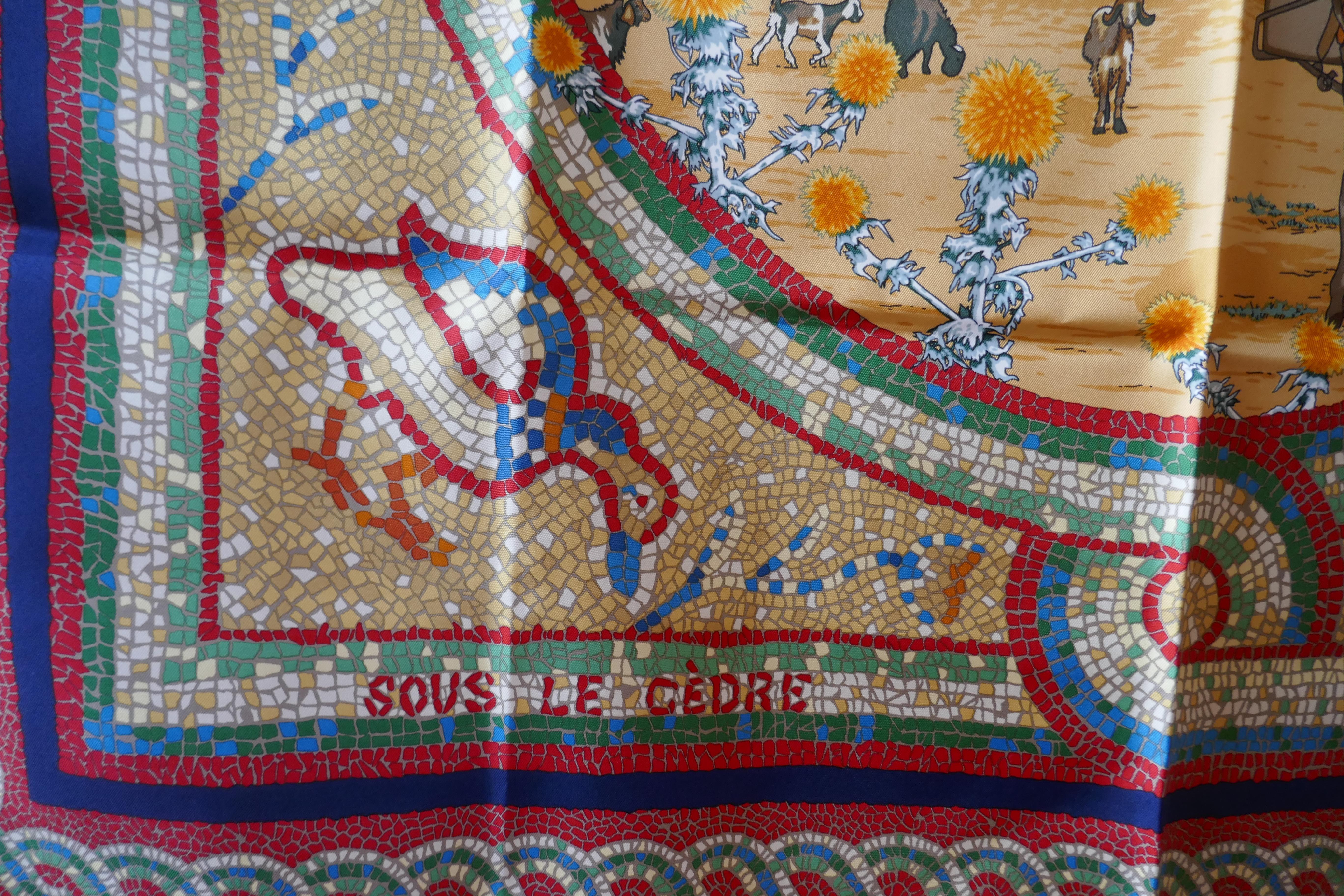 Hermes Silk Scarf “ Sous le Cedre” Design by Dimitri Rybaltchenko 

Smart, Luxurious, Authentic un worn original Hermes Silk Scarf, “In the shade of the African tree”,  with mosaic border
Wonderful design from 2011, the designer's signature and the