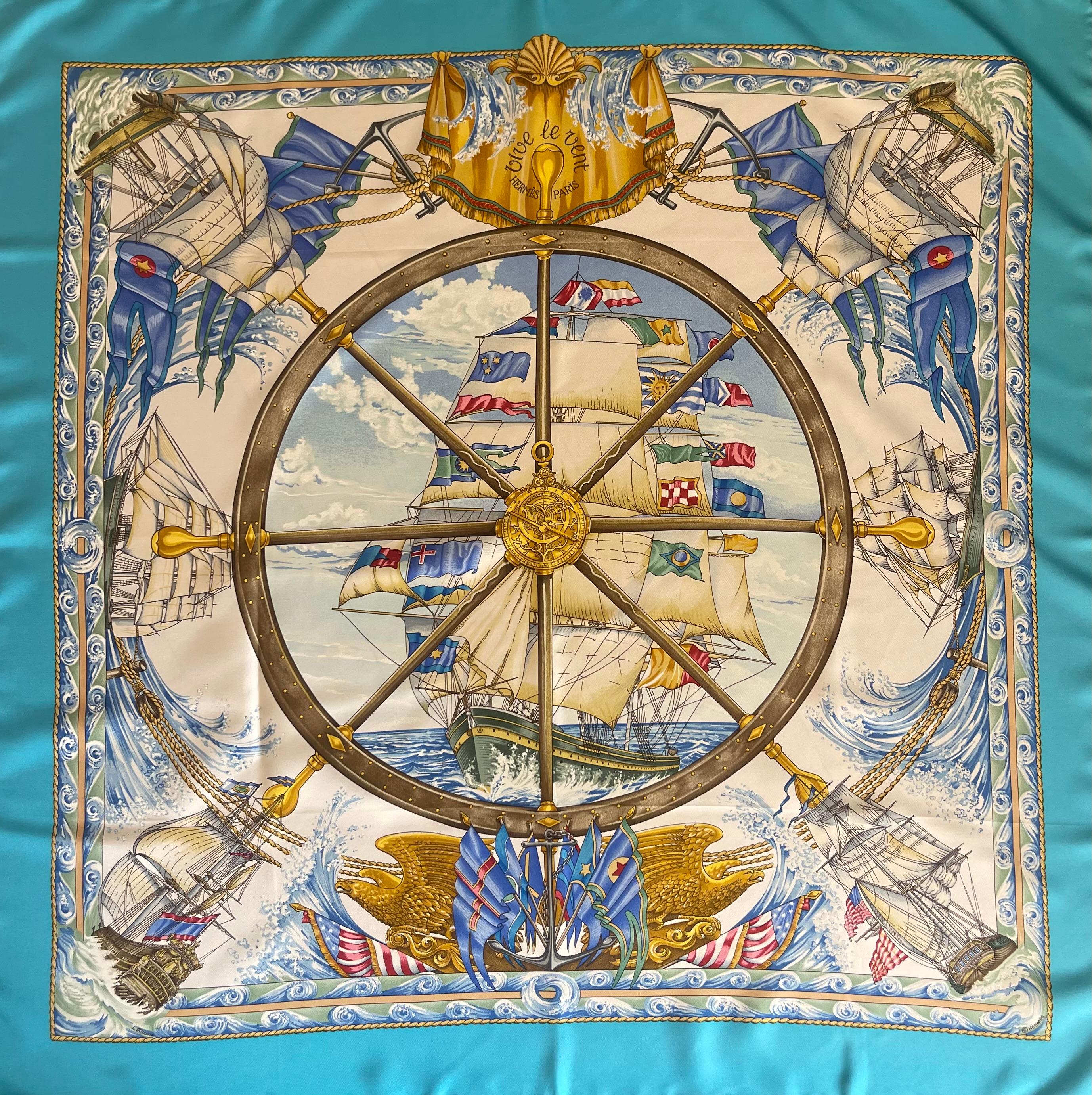 Hermès Silk Scarf “Vive Le Vent” 1992. This beautiful scarf was designed by Laurence Bourthoumieux in 1992 and then reissued in 1995 due to its popularity. The colors are bold, vibrant and easy to wear year round. Please note this item is in good