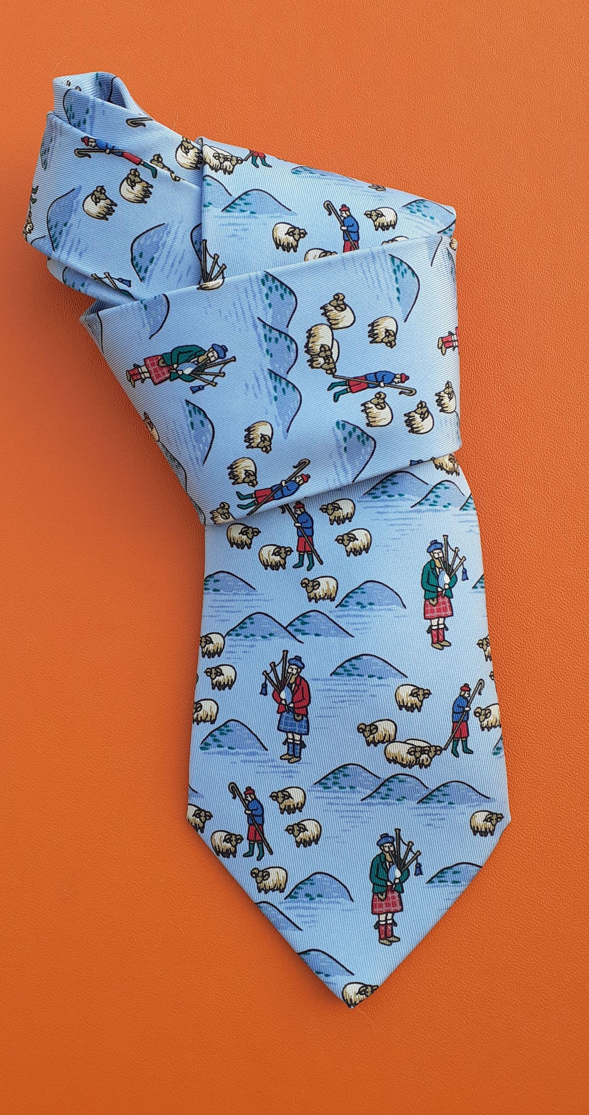 Cute Authentic Hermès Tie

Print: bagpipes and sheep

Made in France

100% Silk

Colorways: Sky Blue, White, Blue, Red, Green

Lined with plain sky blue silk

