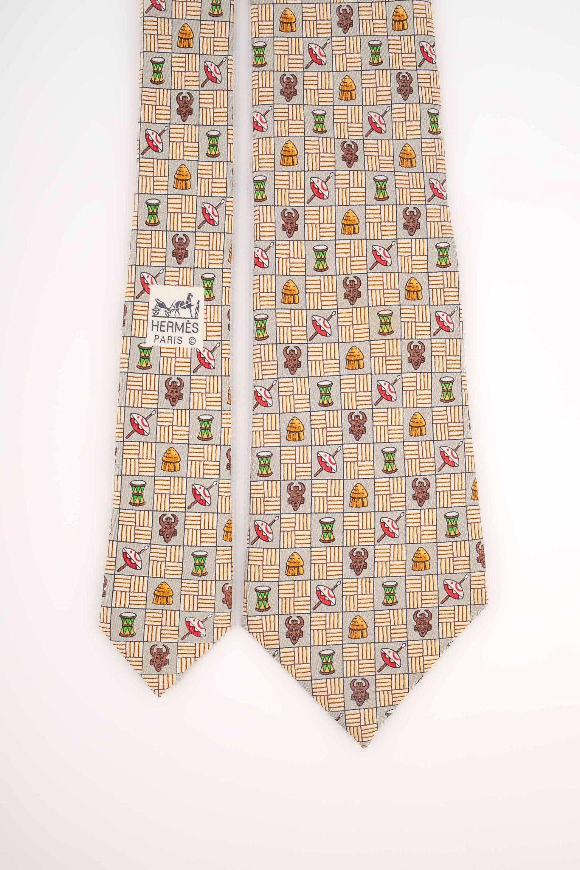 Beige Hermès Silk Tie Printed with African Patterns For Sale