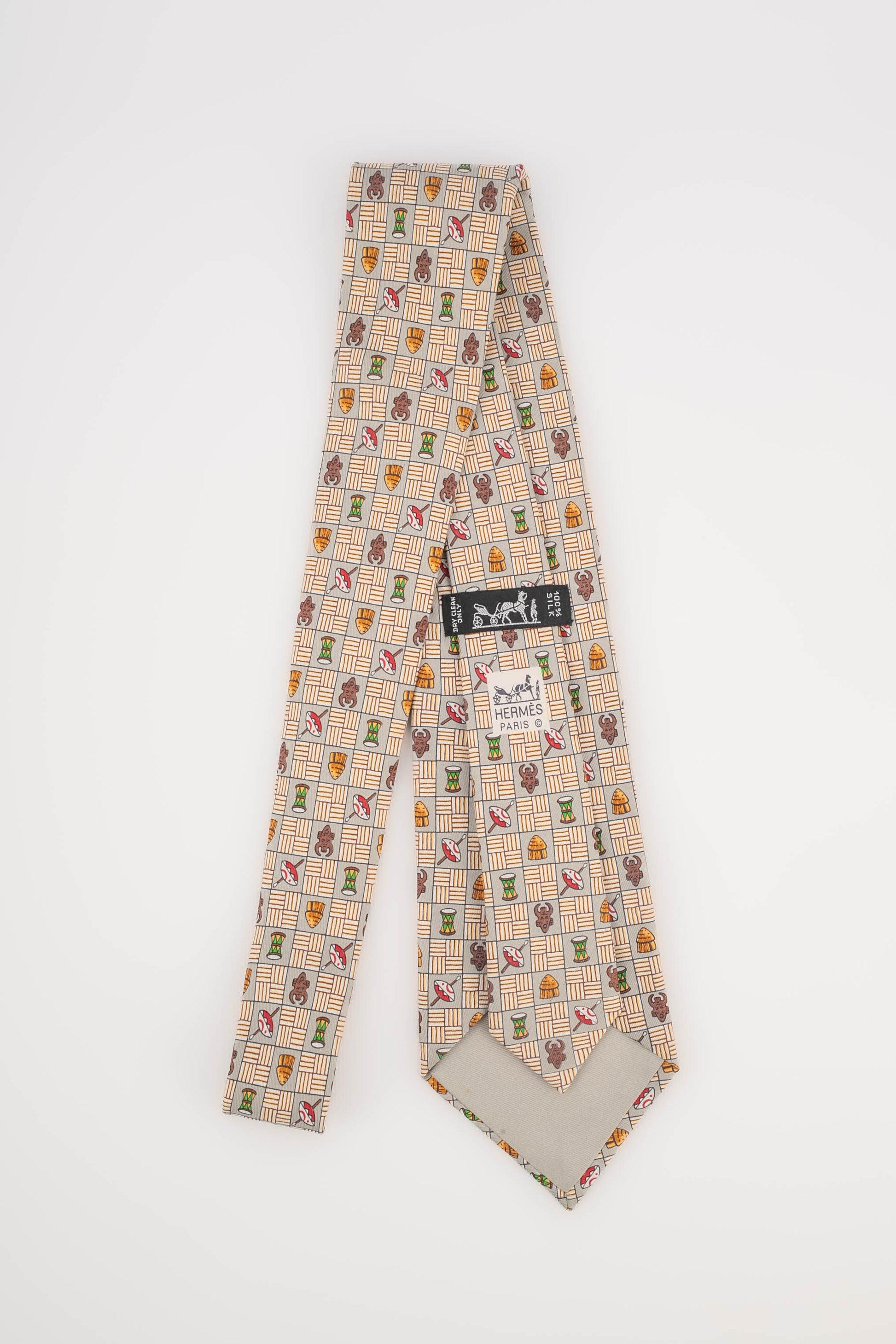 Hermès Silk Tie Printed with African Patterns In Excellent Condition For Sale In SAINT-OUEN-SUR-SEINE, FR