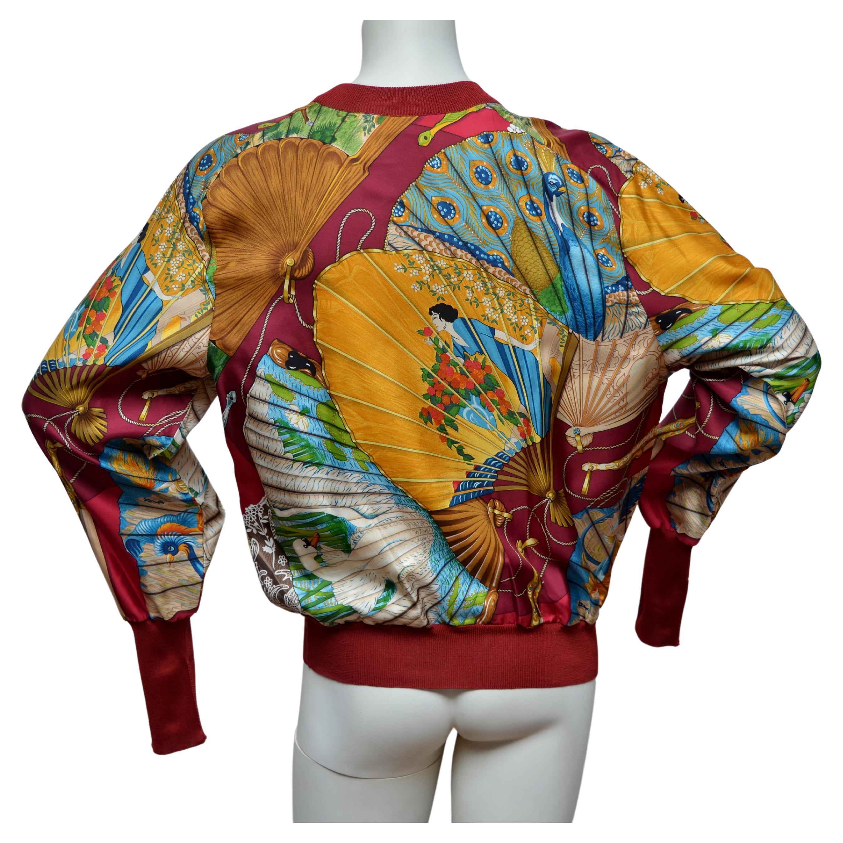 Hermes 100% silk vintage sweatshirt 
Multicolor with peacock and swan print.
Fabric looks new and unworn.
Size 38 Fr.Made in France
FINAL SALE