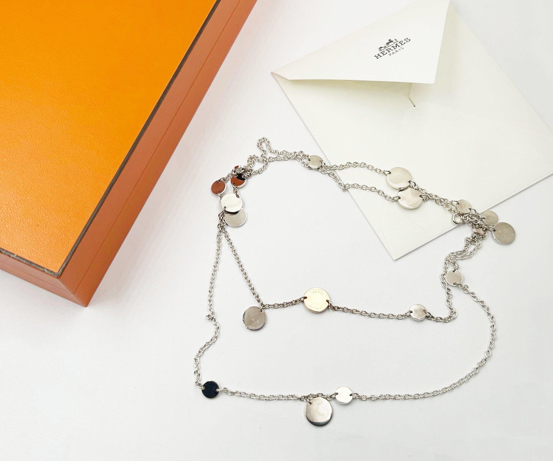Hermes Silver 925 Gold 750 Confetti Necklace

*Marked Hermes
*Sterling 925 and Rose Gold 750
*Made in France
*Comes with the original box and booklet

-It's approximately 33