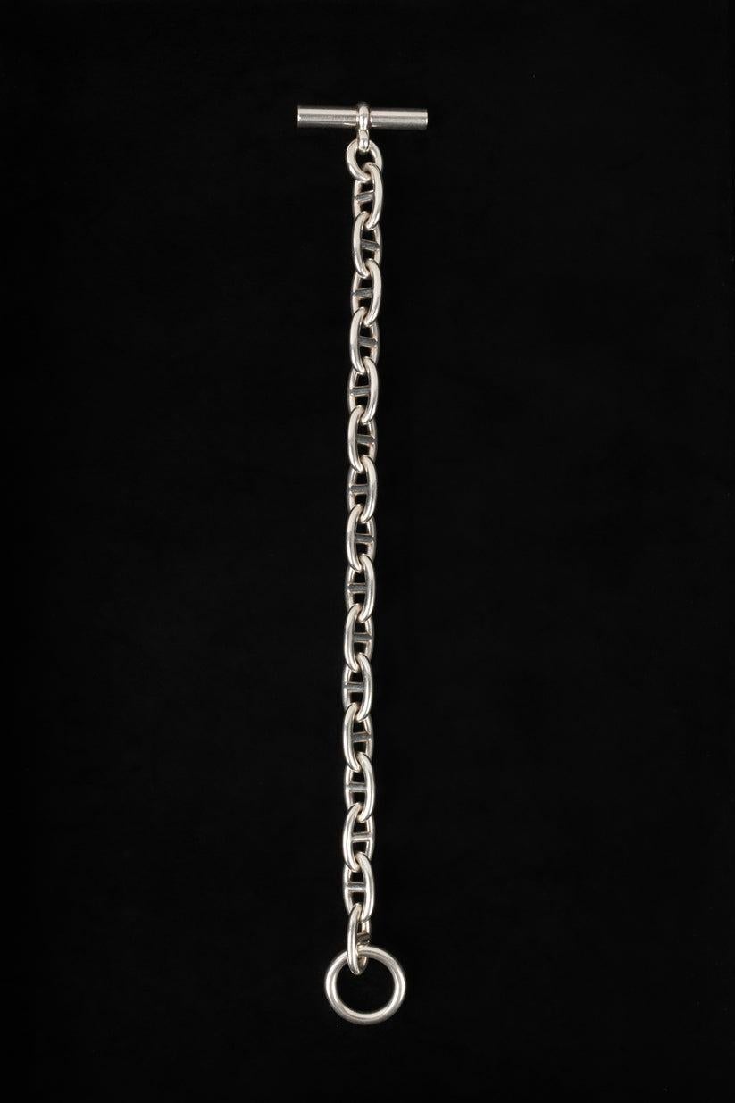 Hermès - (Made in France) Silver anchor chain bracelet.

Additional information:
Condition: Very good condition
Dimensions: Length: 25 cm - Width: 1.2 cm

Seller Reference: BRA111