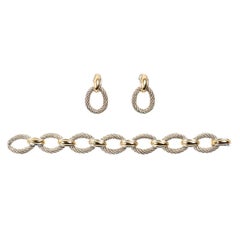 Hermès Silver and Gold Oval Link Bracelet and Earrings, French, circa 1960