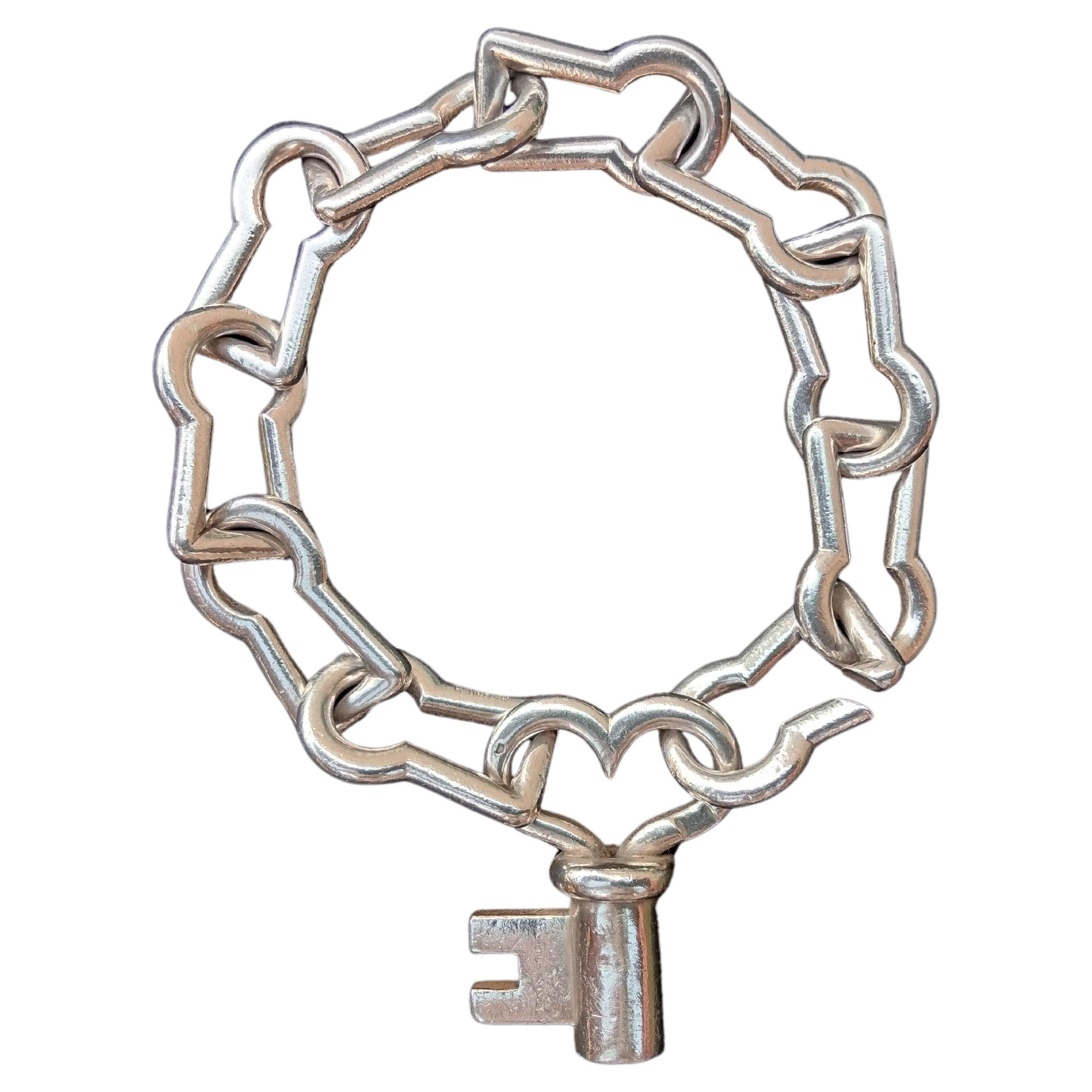Hermès Silver Bracelet Keyhole Shaped Links Key Charm Clasp
