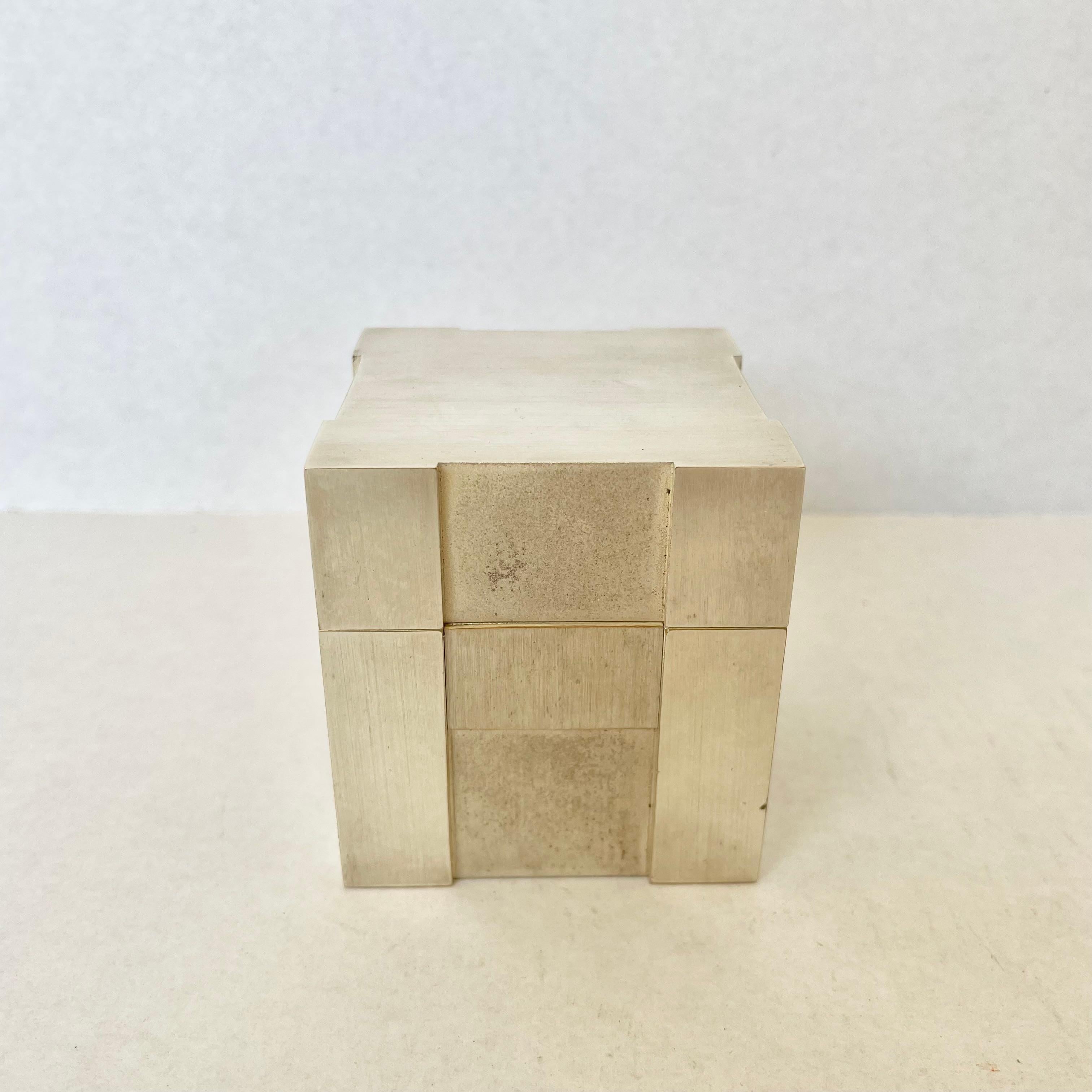 Magnificent cube lighter by Hermes, Paris, circa 1960s France. Hermes H displayed on all 4 sides. Silver plated. Stamped Hermes, Paris underneath. Heavy and substantial piece. Lots of presence. Perfect on a desktop or bar. Working lighter.
 