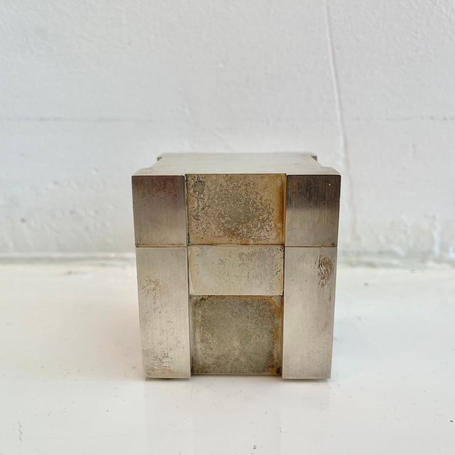 Magnificent cube lighter by Hermes, Paris, circa 1960s France. Hermes H displayed on all 4 sides. Silver plated. Stamped Hermes, Paris underneath. Heavy and substantial piece. Lots of presence. Perfect on a desktop or bar. Working lighter. 
 