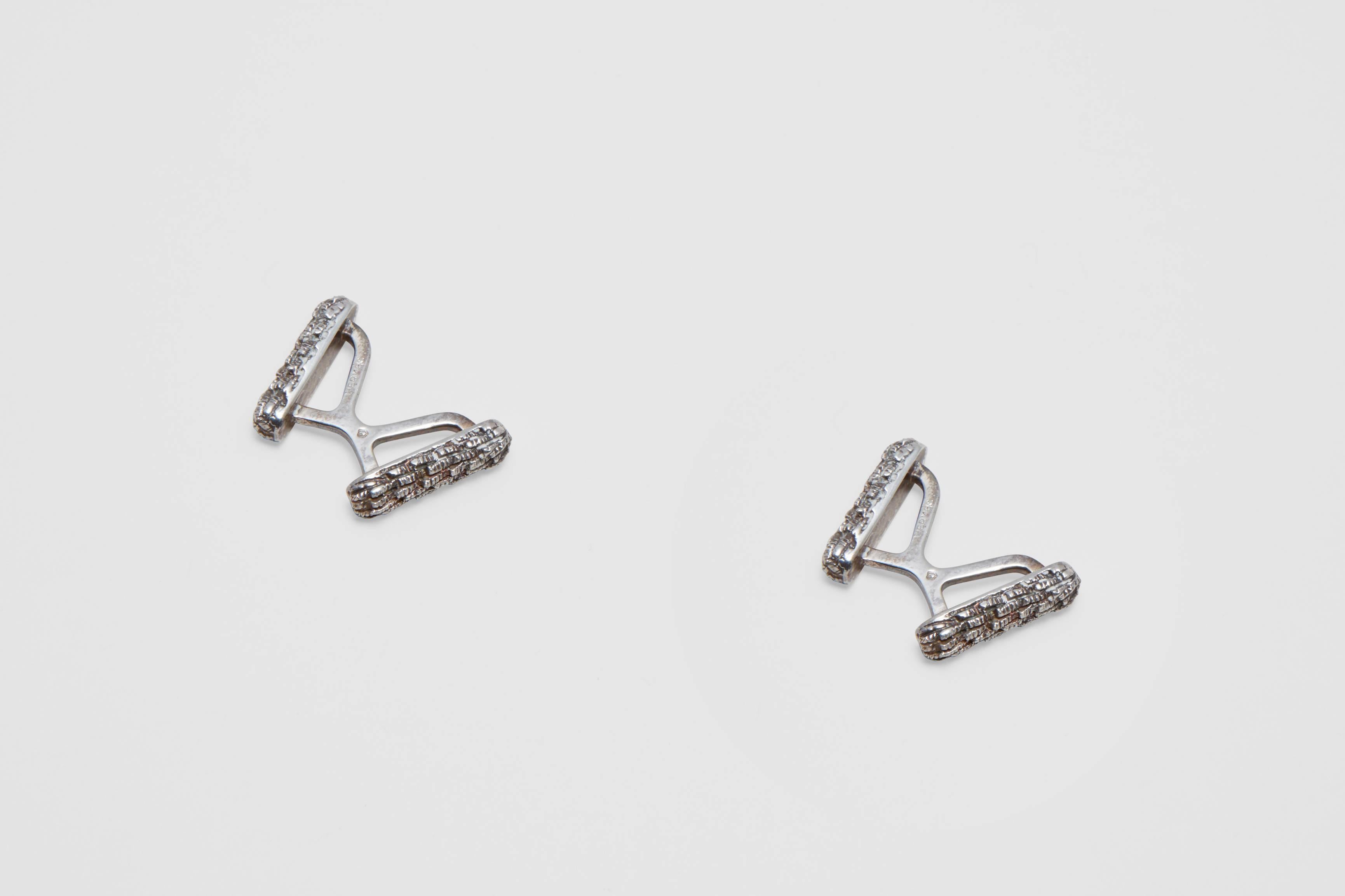A pair of sterling silver cufflinks made in a very Brutalist design. This exceptionally rare form of cufflink was made by the luxury retailer; Hermès. This design is something that was very unusual to come from a normally 'conservative', or thematic